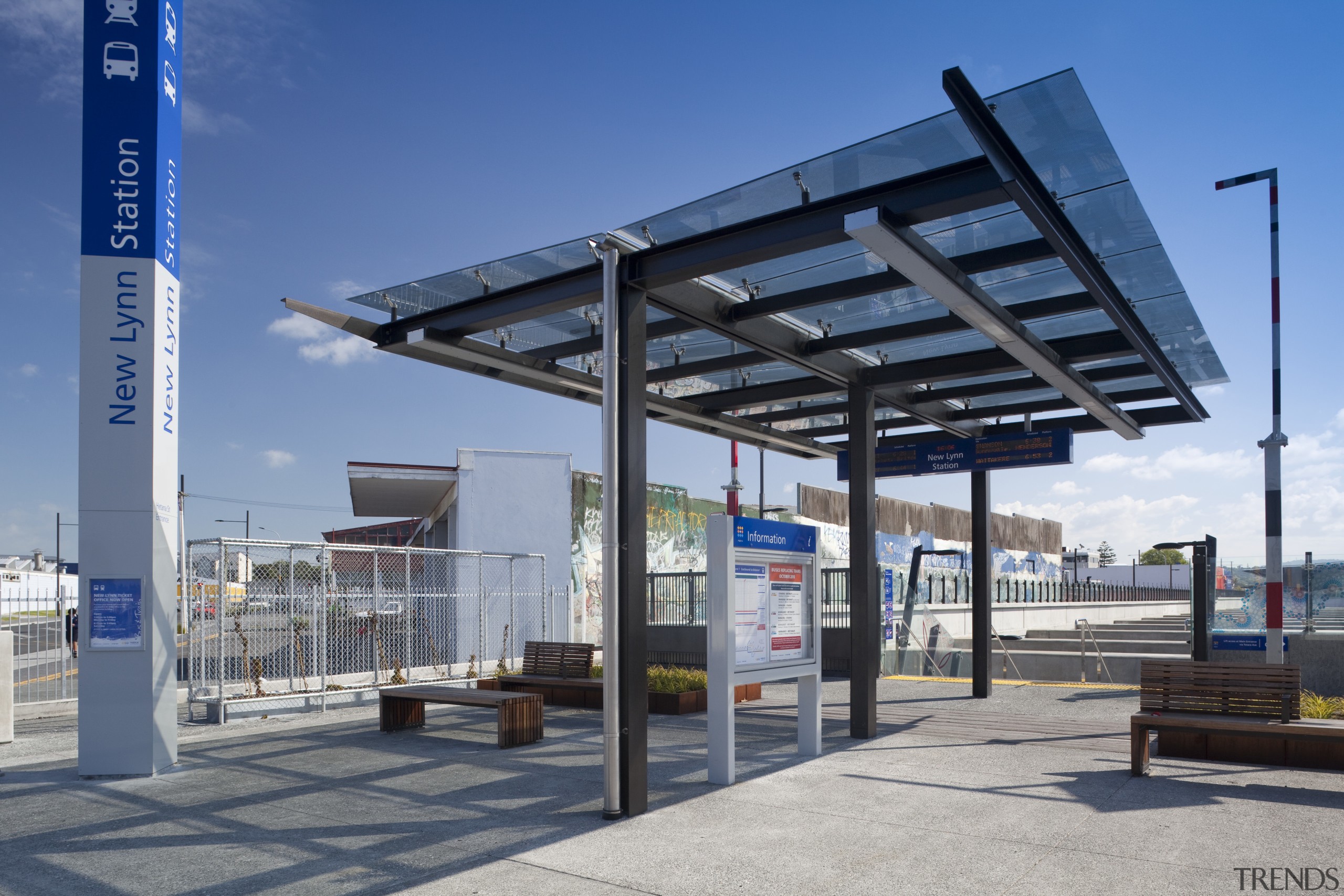 Specialist architectural glazing company Glass Projects supplied and bus stop, gray, blue