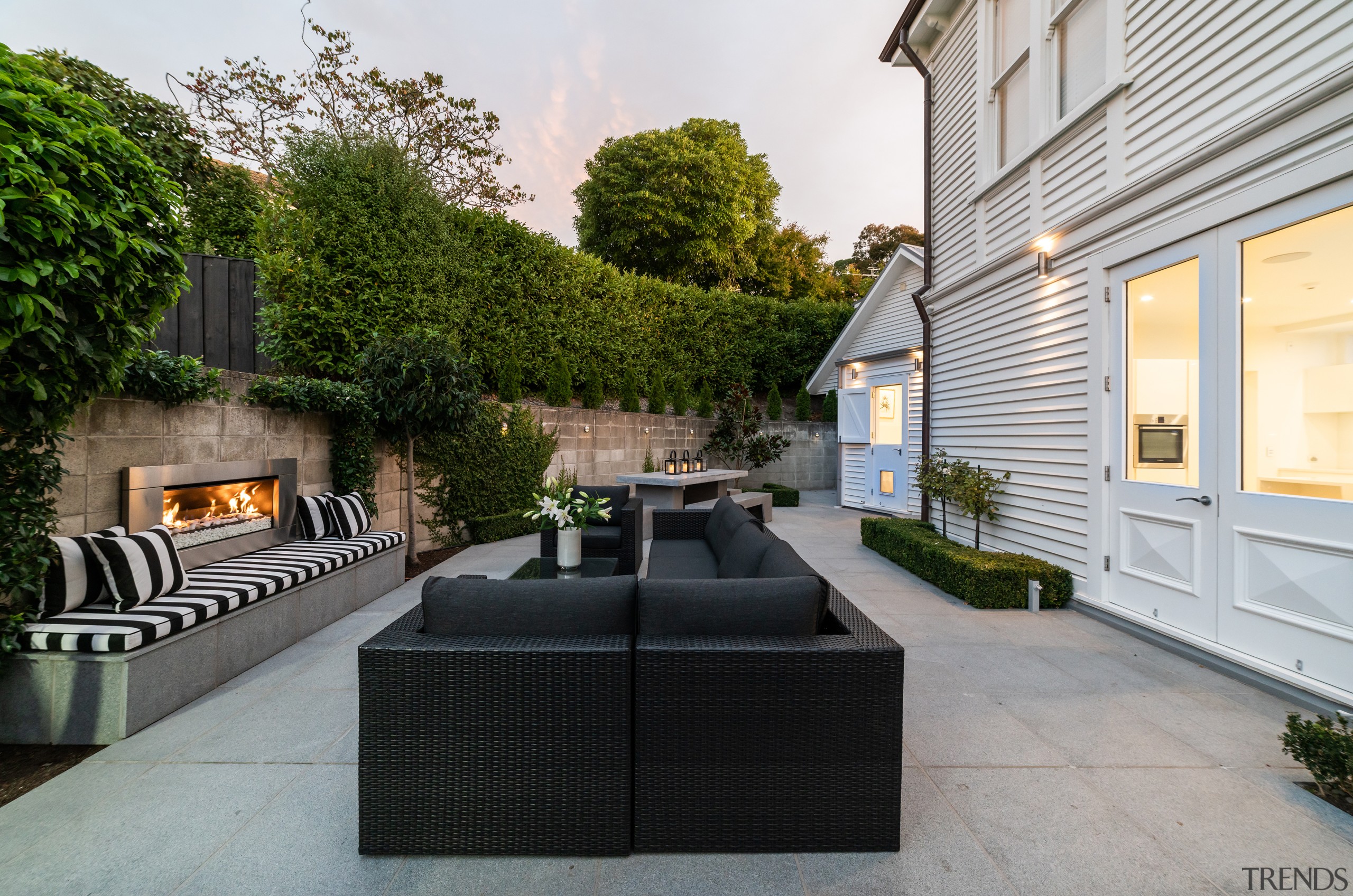 A sheltered outdoor living space was introduced at 