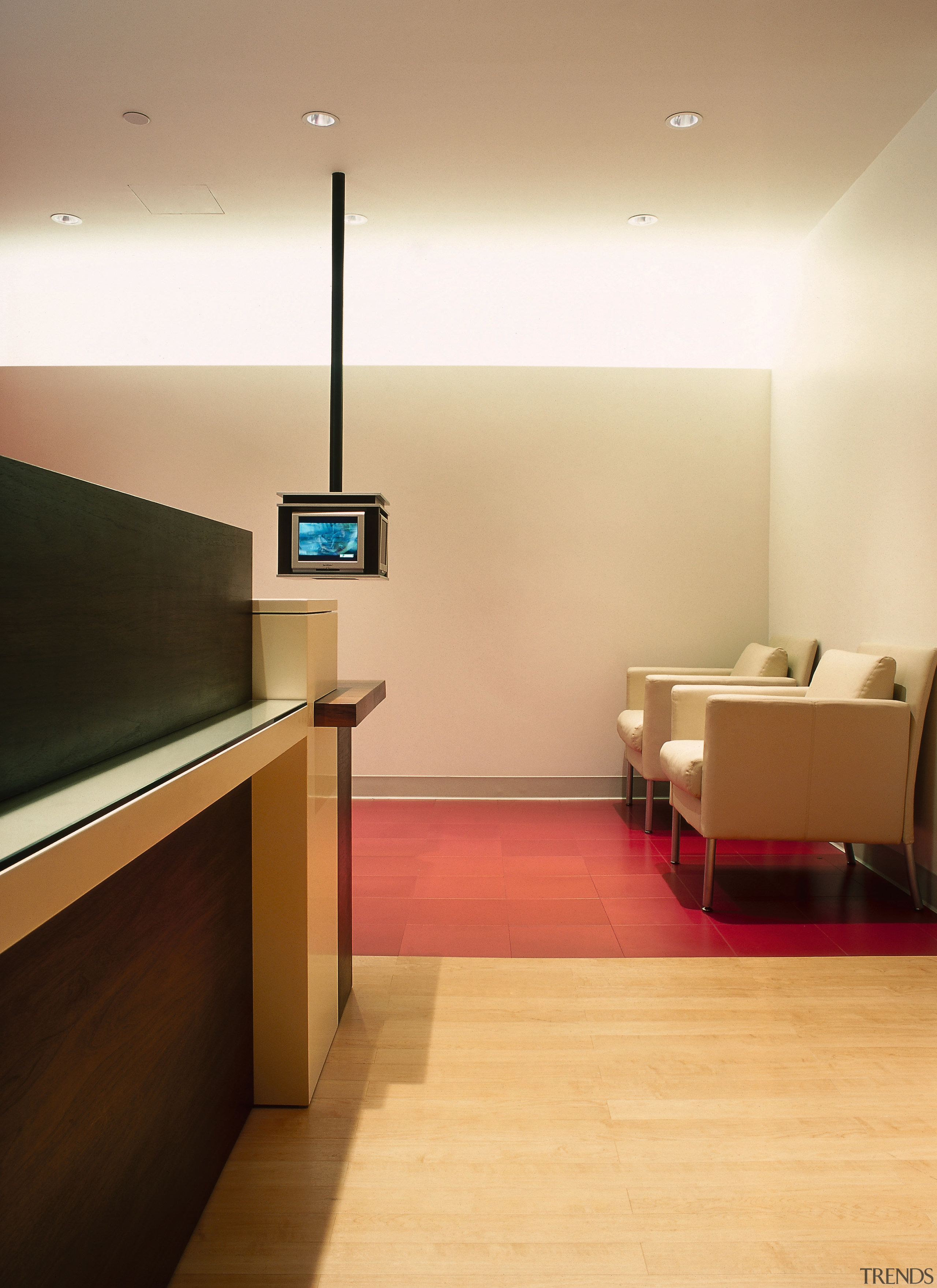 A view of the reception area, tiled floor, ceiling, floor, flooring, furniture, hardwood, interior design, laminate flooring, light fixture, lighting, product design, room, table, wall, wood, wood flooring, orange