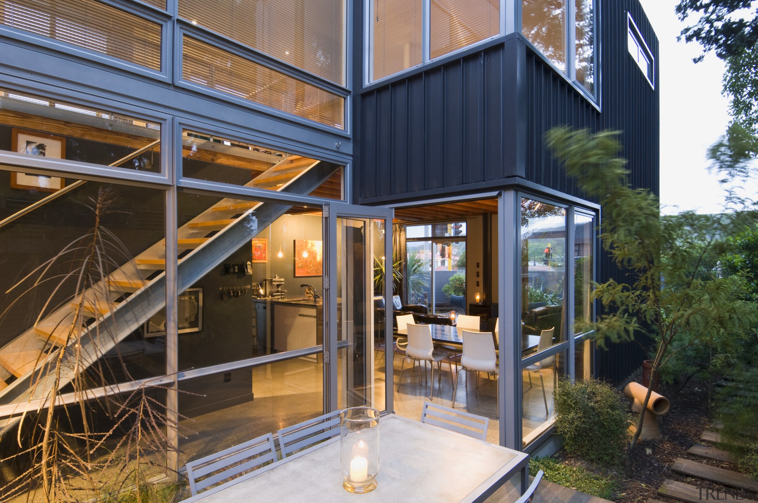 Exterior view of the paved courtyard with glazing, architecture, home, house, real estate, brown