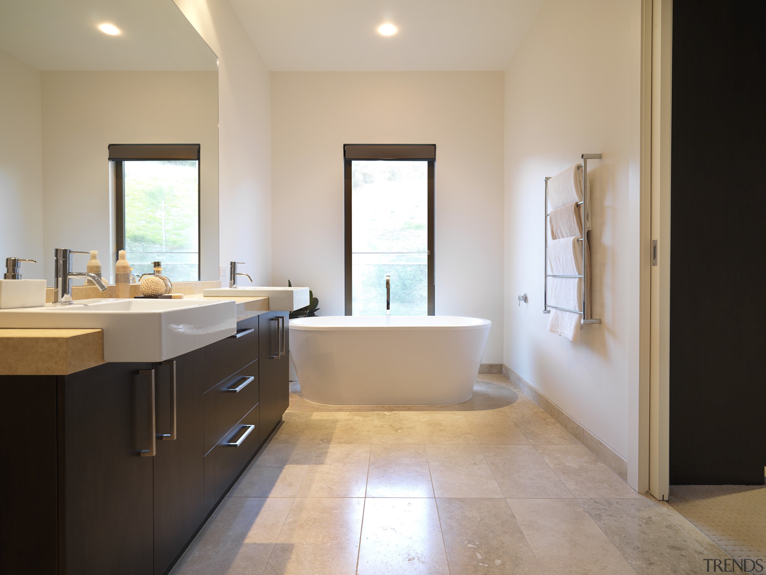 Bathroom, featuring vanity with dark-stained timber cabinetry and bathroom, bathroom accessory, bathroom cabinet, estate, floor, flooring, home, interior design, property, real estate, room, sink, tile, window, gray