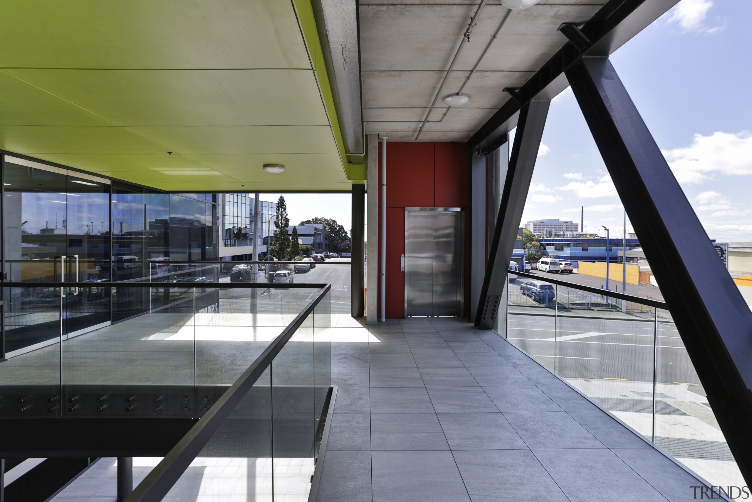 Broad walkways provide a direct circulation link from architecture, building, daylighting, gray