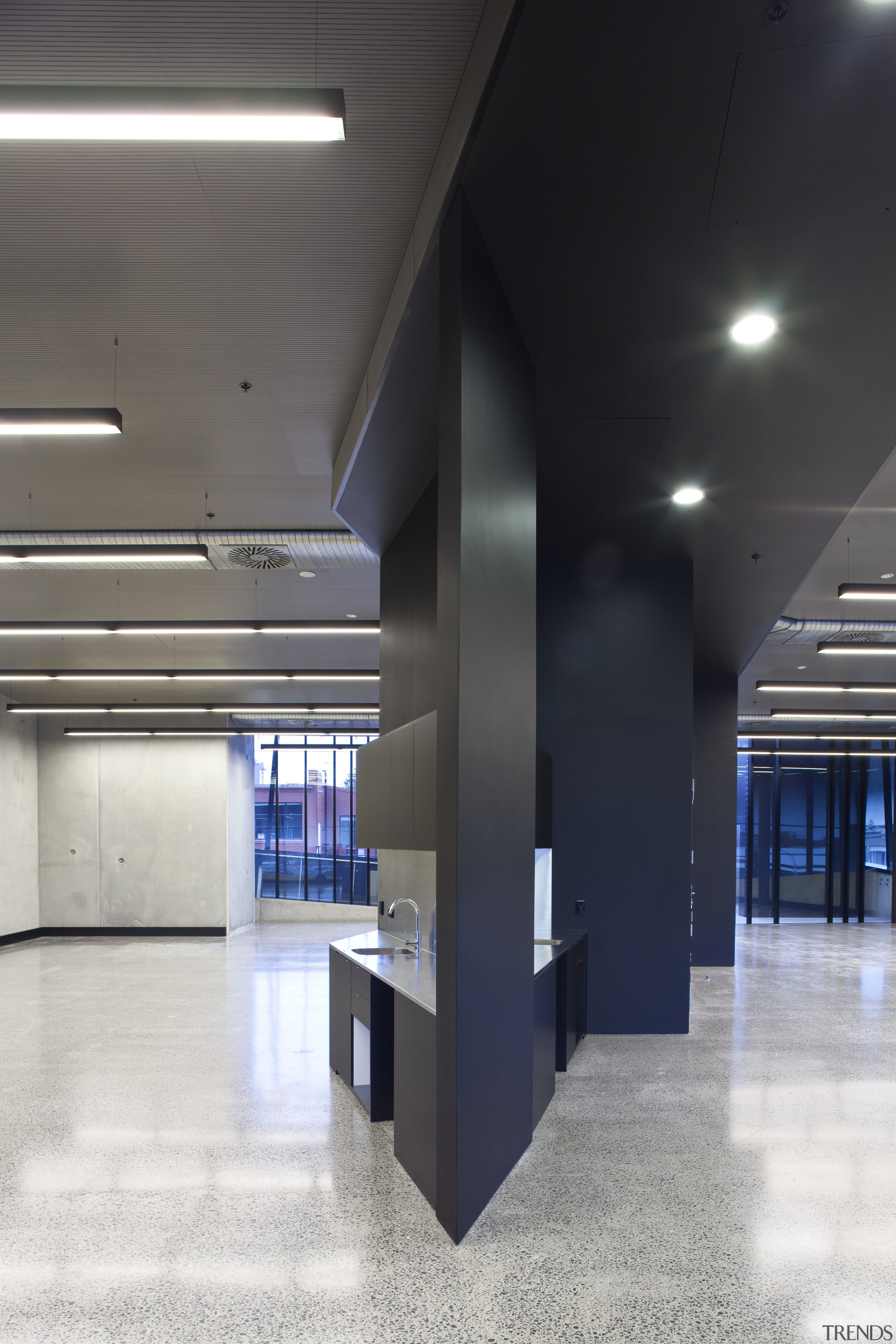 View of the Anvil Building, with angled custom architecture, ceiling, daylighting, floor, interior design, lobby, black, gray