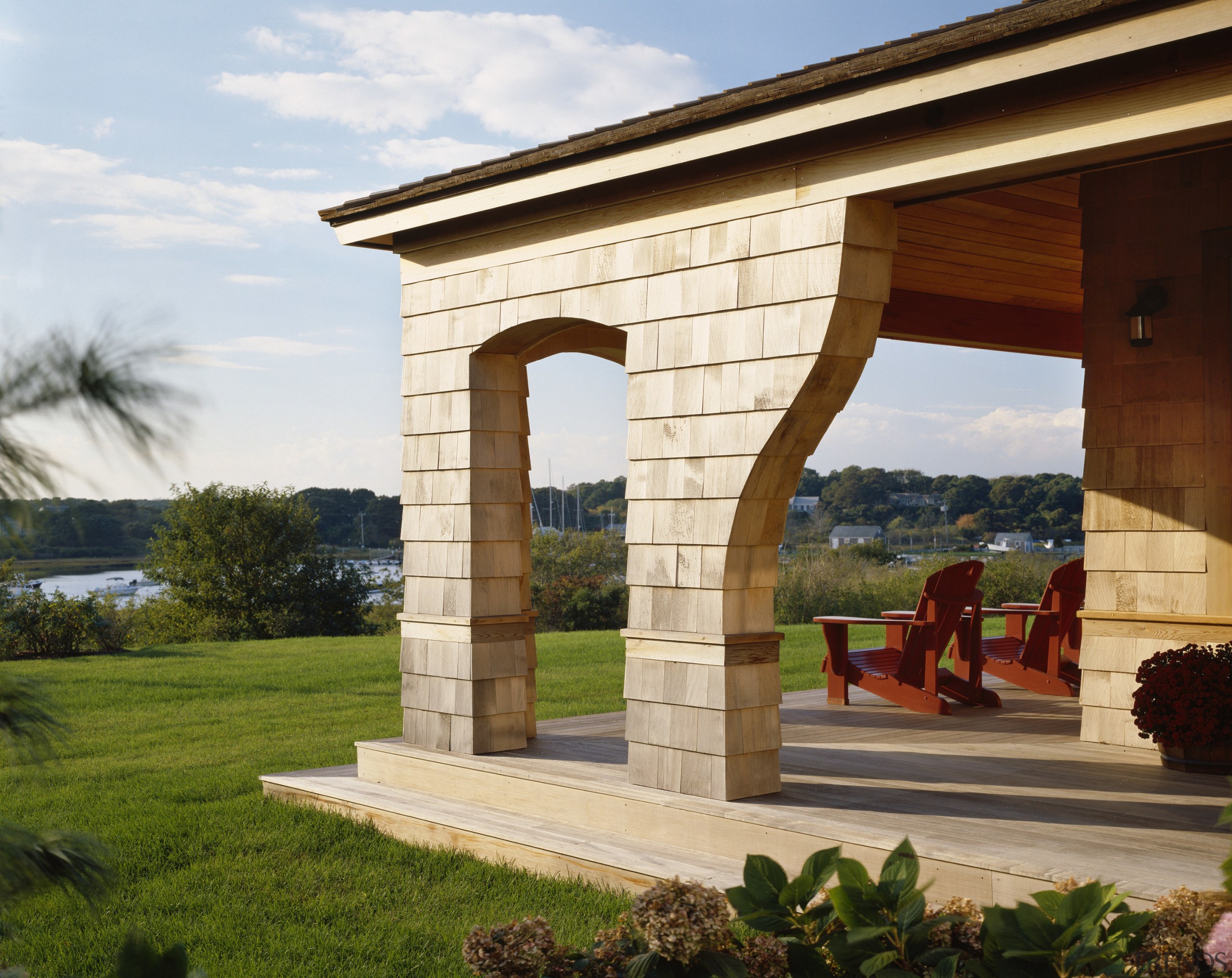 Exterior view of a patio area with outdoor estate, home, outdoor structure, real estate, brown, white