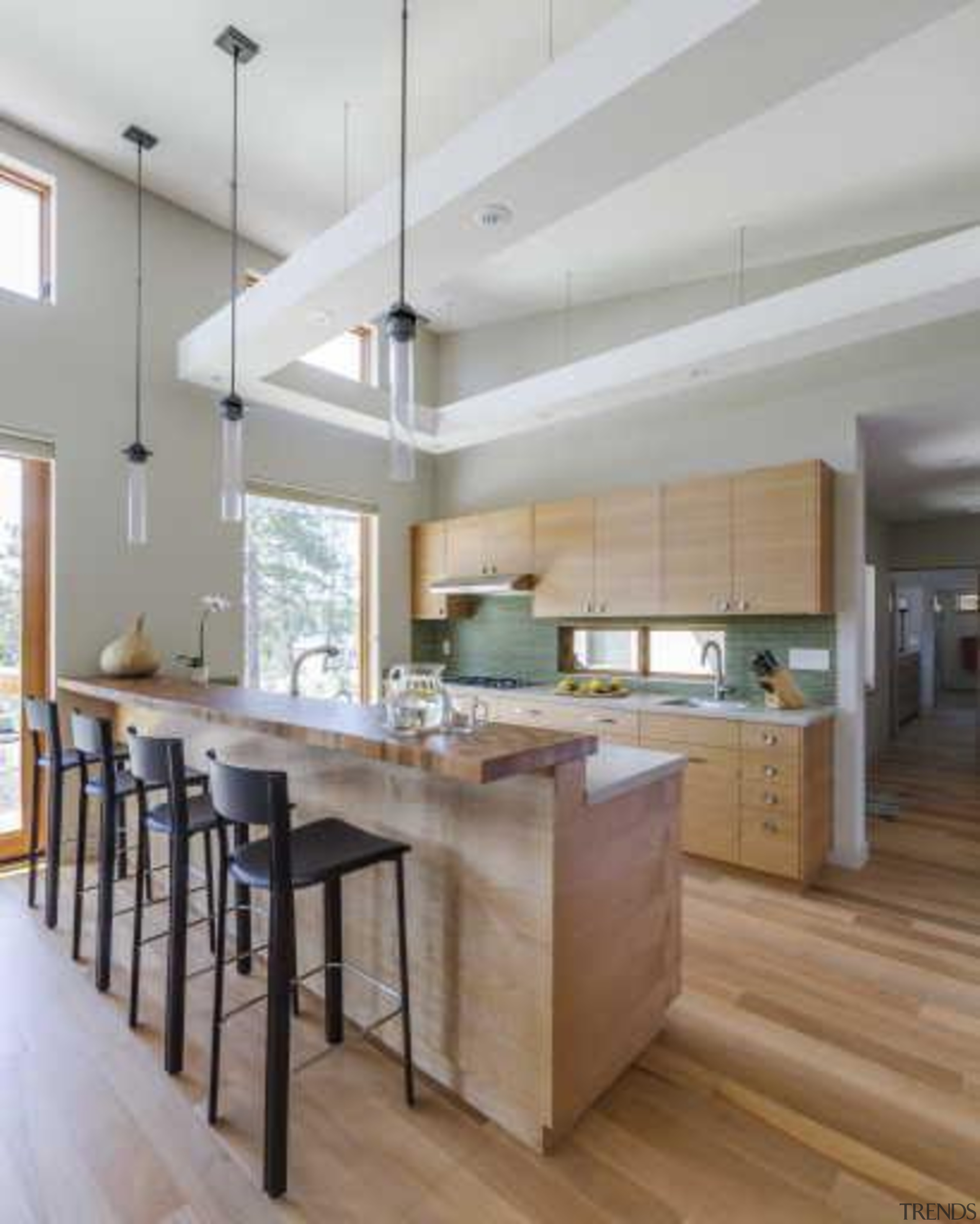 This home looks the part in a winter cabinetry, ceiling, countertop, cuisine classique, floor, flooring, hardwood, interior design, kitchen, laminate flooring, wood flooring, gray