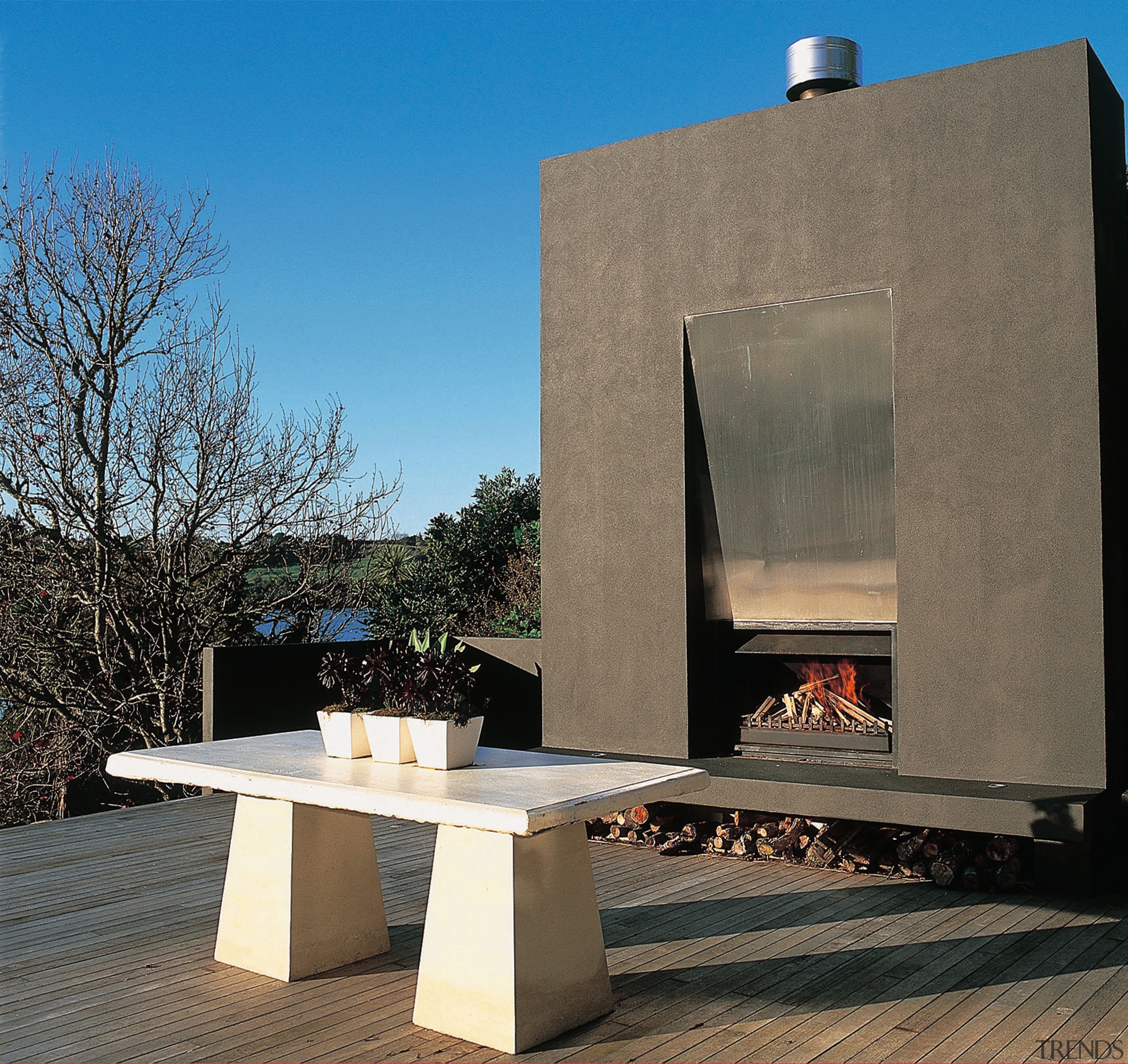 view of this outdoor fire place located on architecture, furniture, table