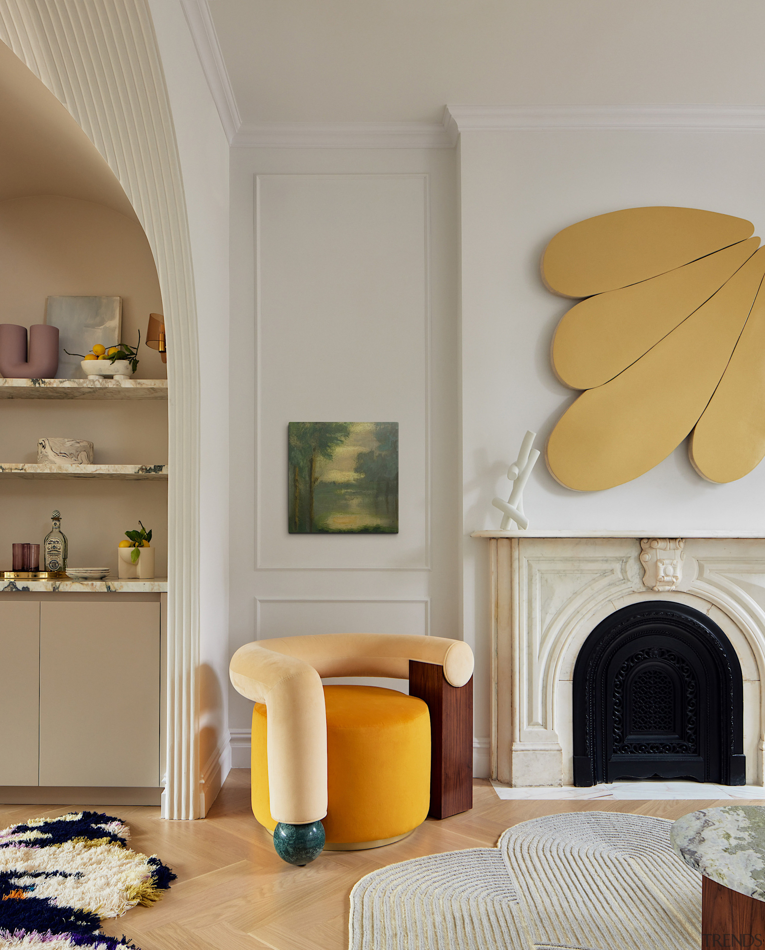 A gold painted relief by Andrew Zimmerman and 