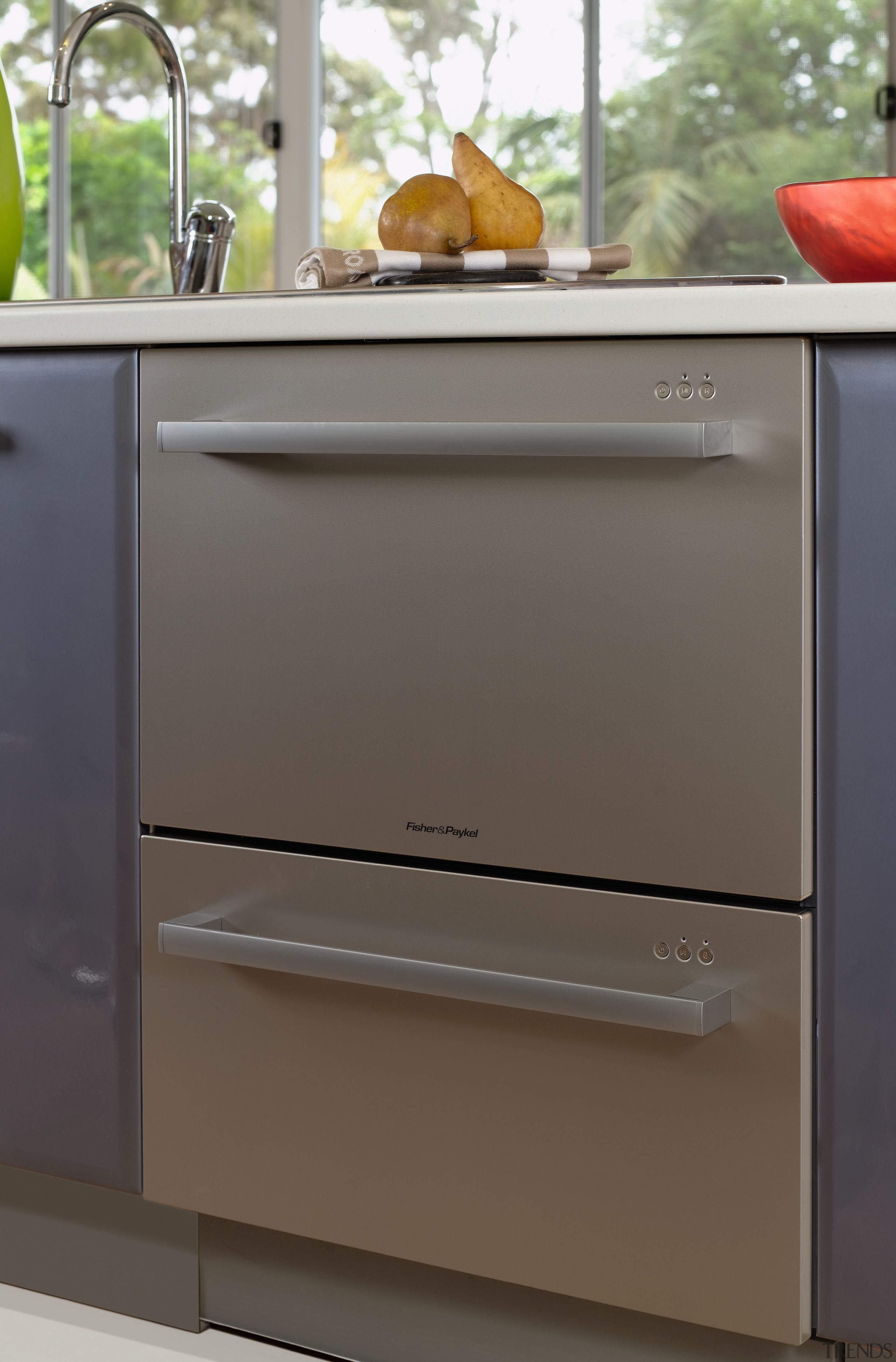 A view of some kitchen appliances from Fisher chest of drawers, drawer, furniture, gas stove, home appliance, kitchen, kitchen appliance, kitchen stove, major appliance, refrigerator, gray