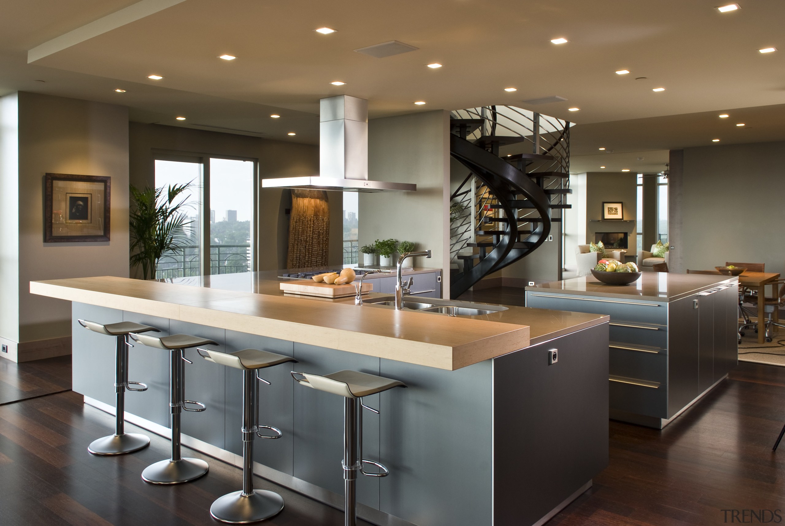 View of contemporary condominium kitchen which features aluminium cabinetry, countertop, cuisine classique, interior design, kitchen, brown