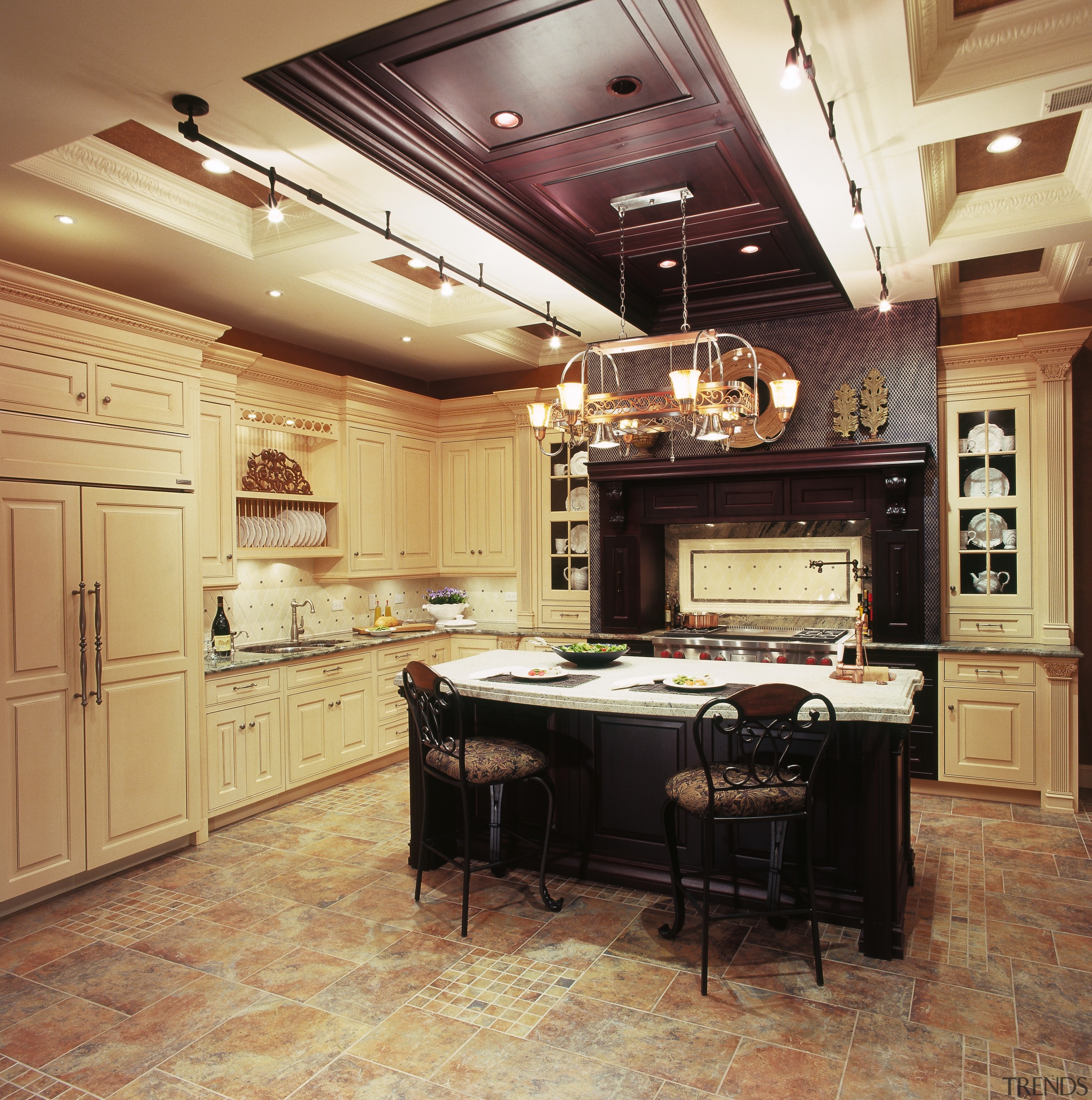 A view of this traditional kitchen featuring Ovation cabinetry, ceiling, countertop, cuisine classique, floor, flooring, interior design, kitchen, room, wood flooring, orange