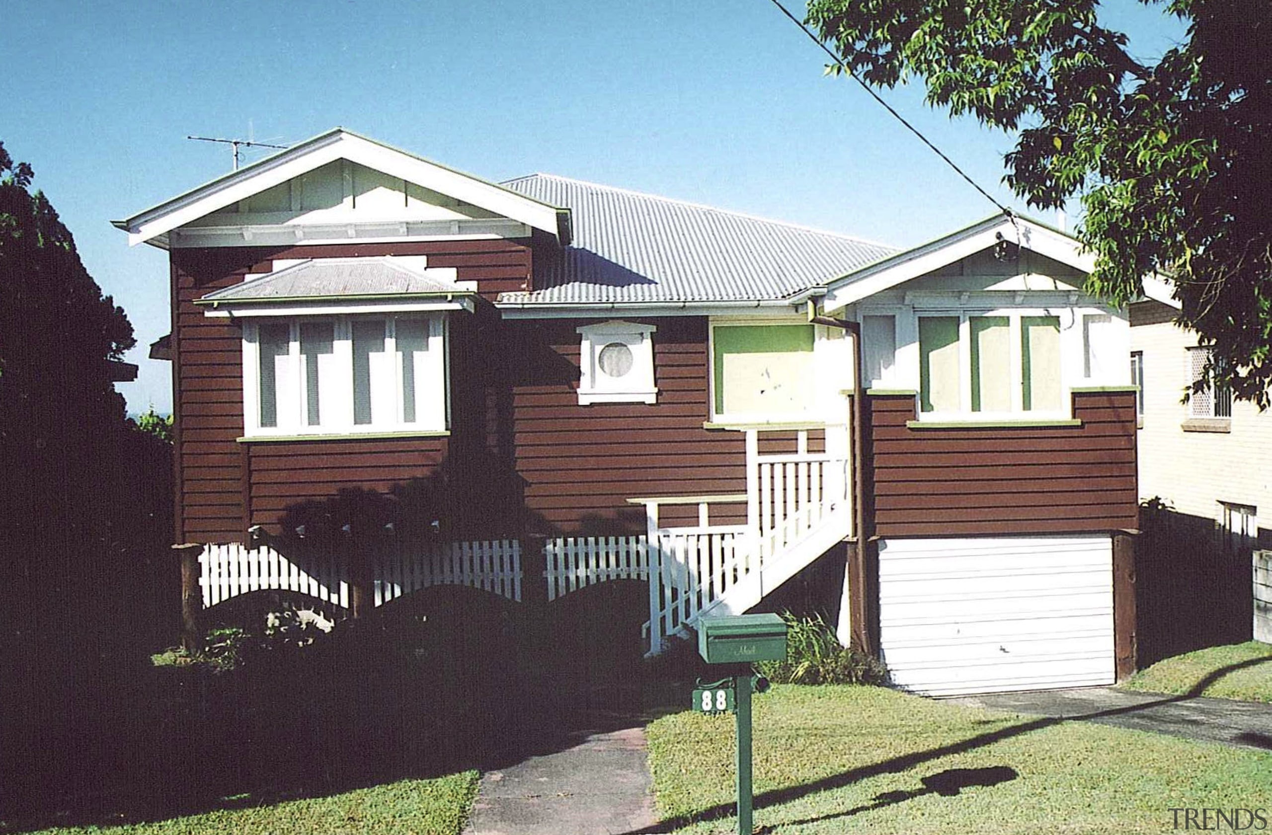 A view of the home before it was cottage, elevation, facade, home, house, neighbourhood, property, real estate, residential area, siding, suburb, black