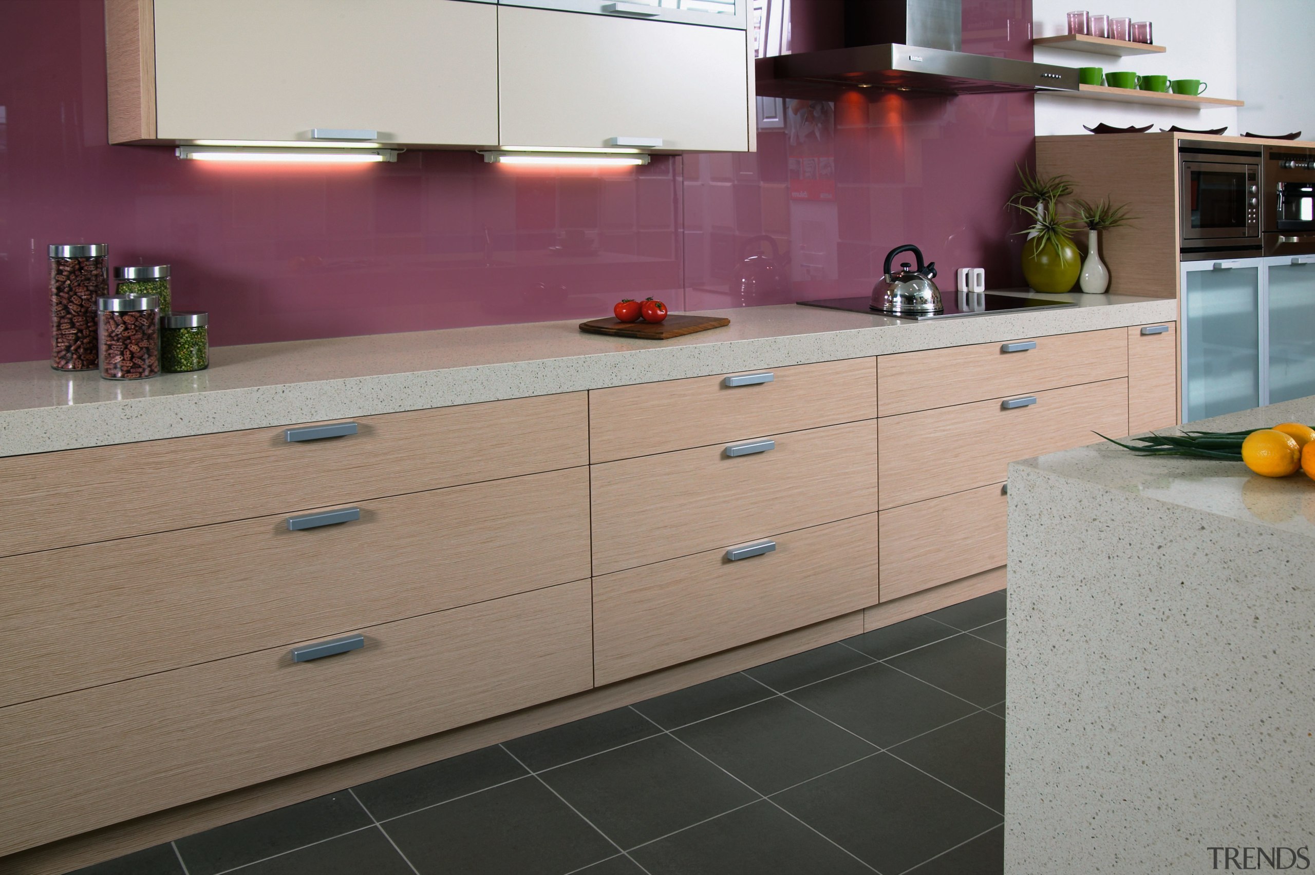 View of a kitchen, black tiled floor, white cabinetry, countertop, floor, flooring, interior design, kitchen, room, tile, wood, gray