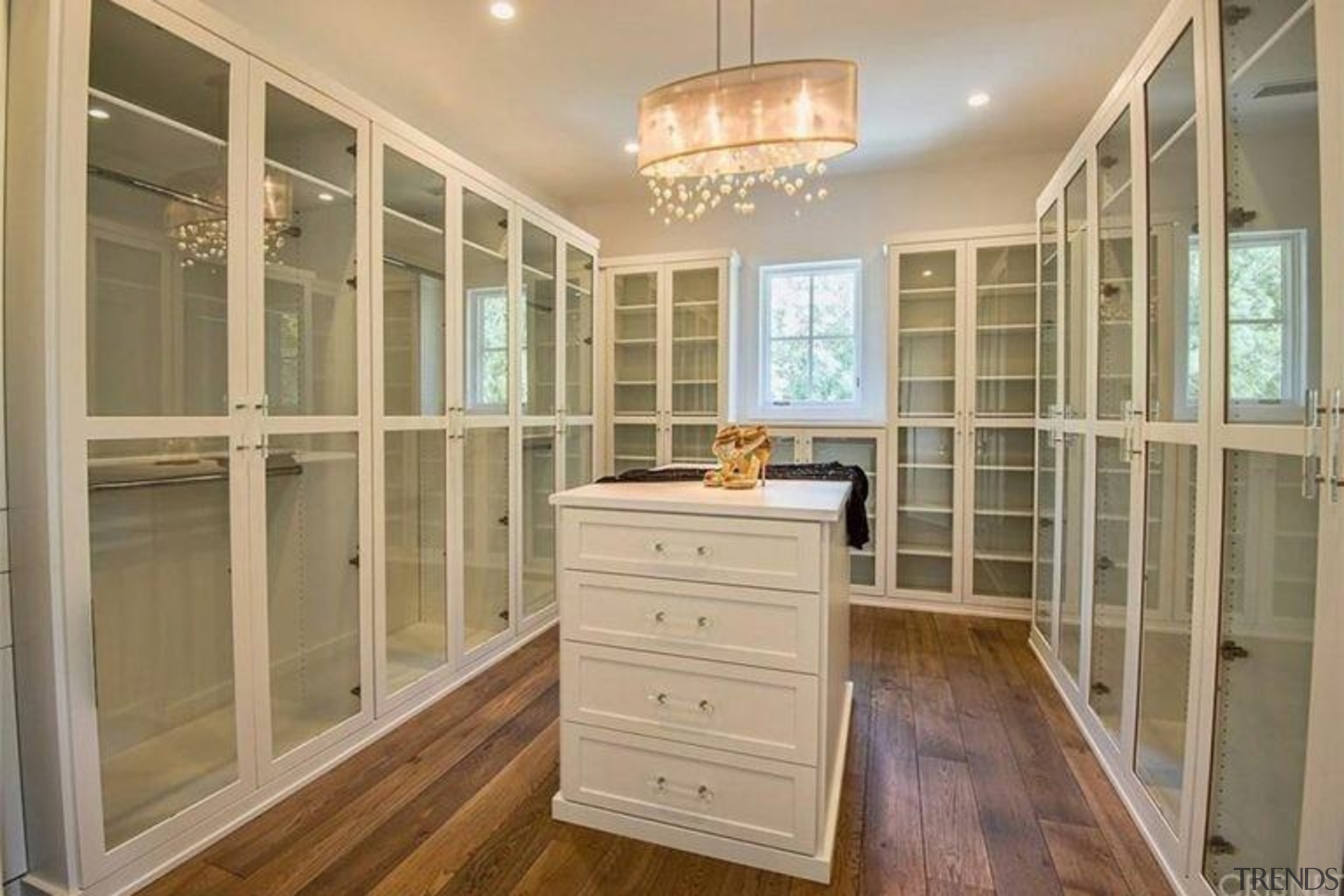 The Weeknd’s massive US$19.995 million mansion - The cabinetry, ceiling, closet, door, estate, floor, flooring, hardwood, home, interior design, laminate flooring, property, real estate, room, window, wood flooring, brown, orange