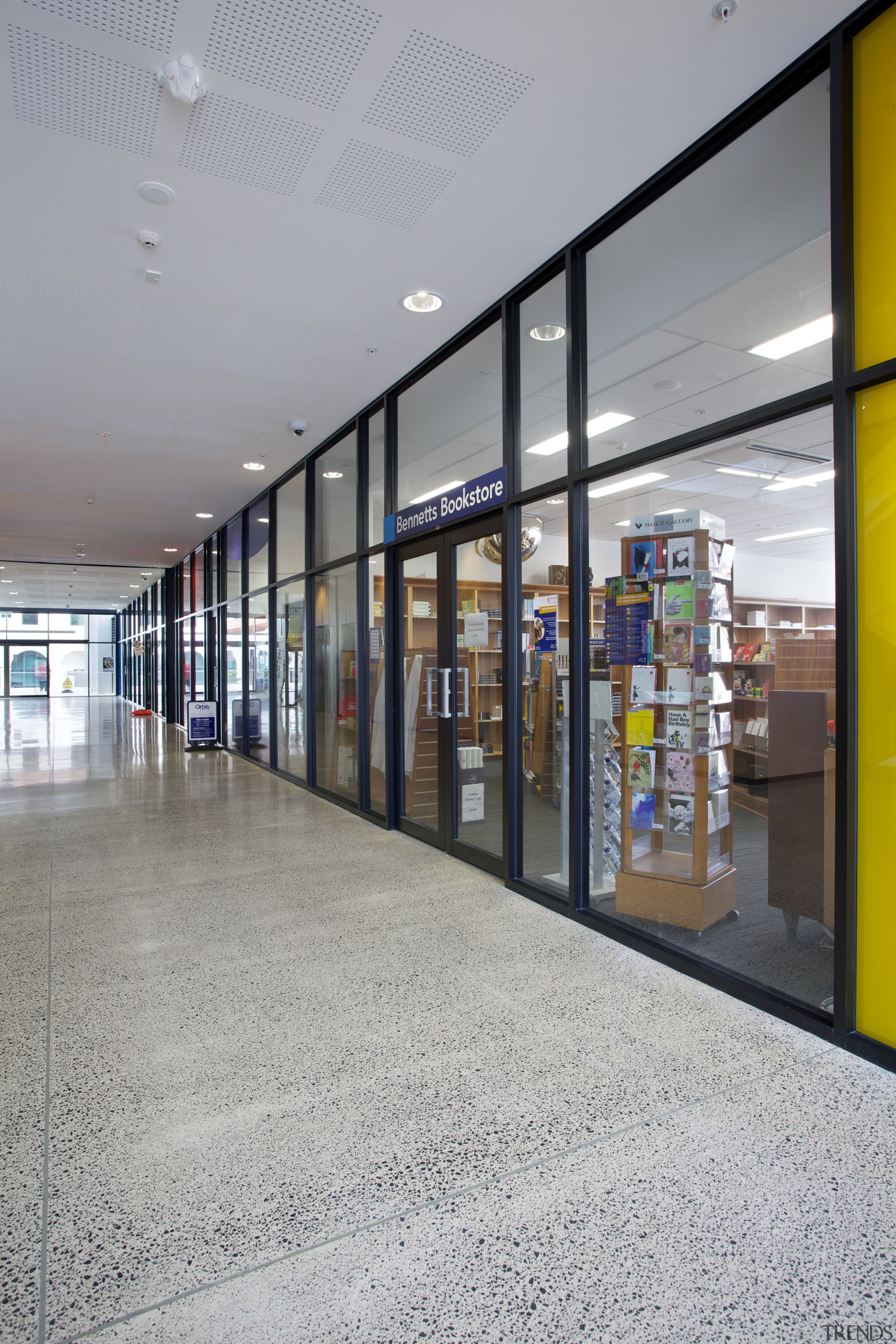 For the matt-look floor required at Massey University architecture, glass, retail, shopping mall, gray
