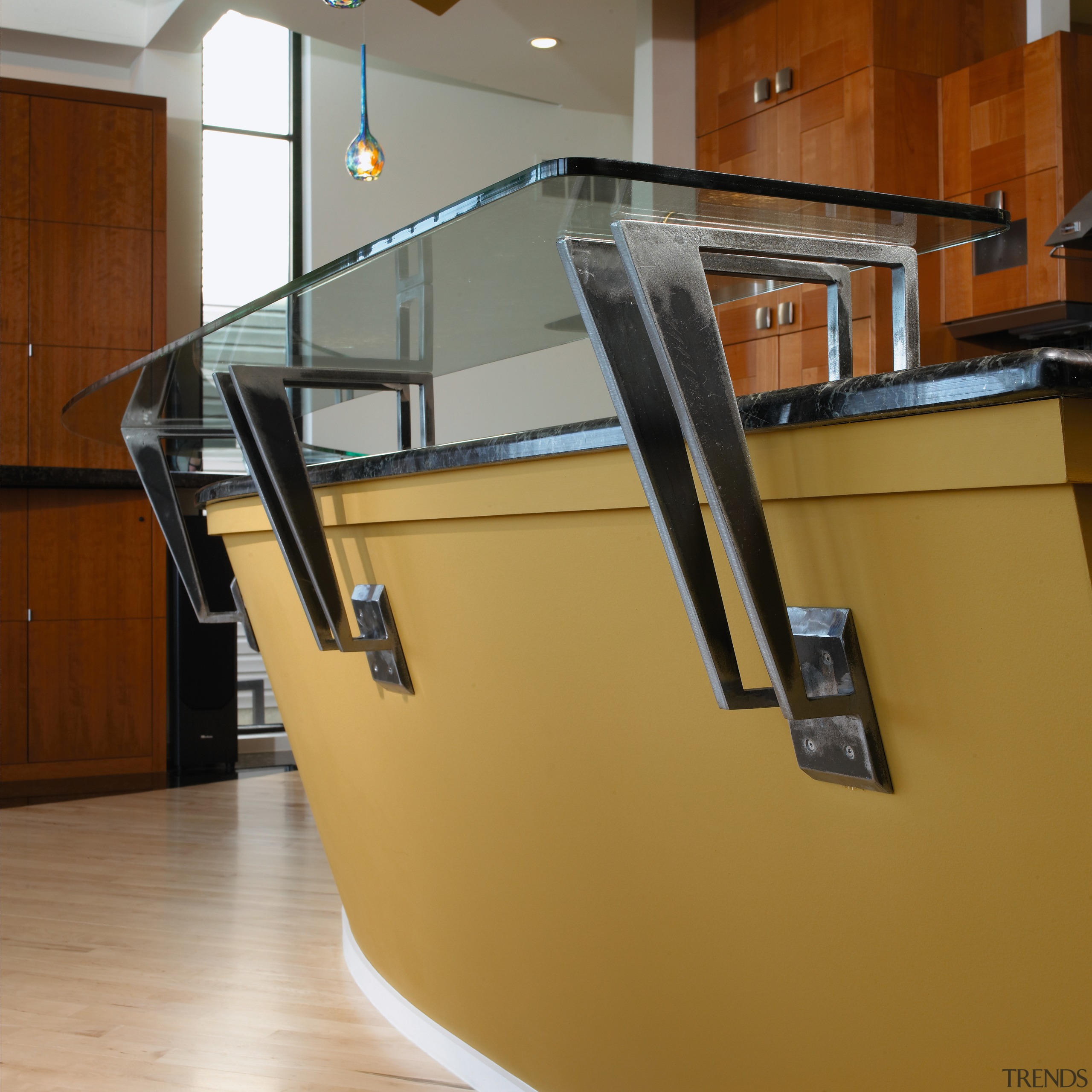 A close up view of the glass breakfast floor, flooring, furniture, glass, handrail, product design, stairs, table, brown