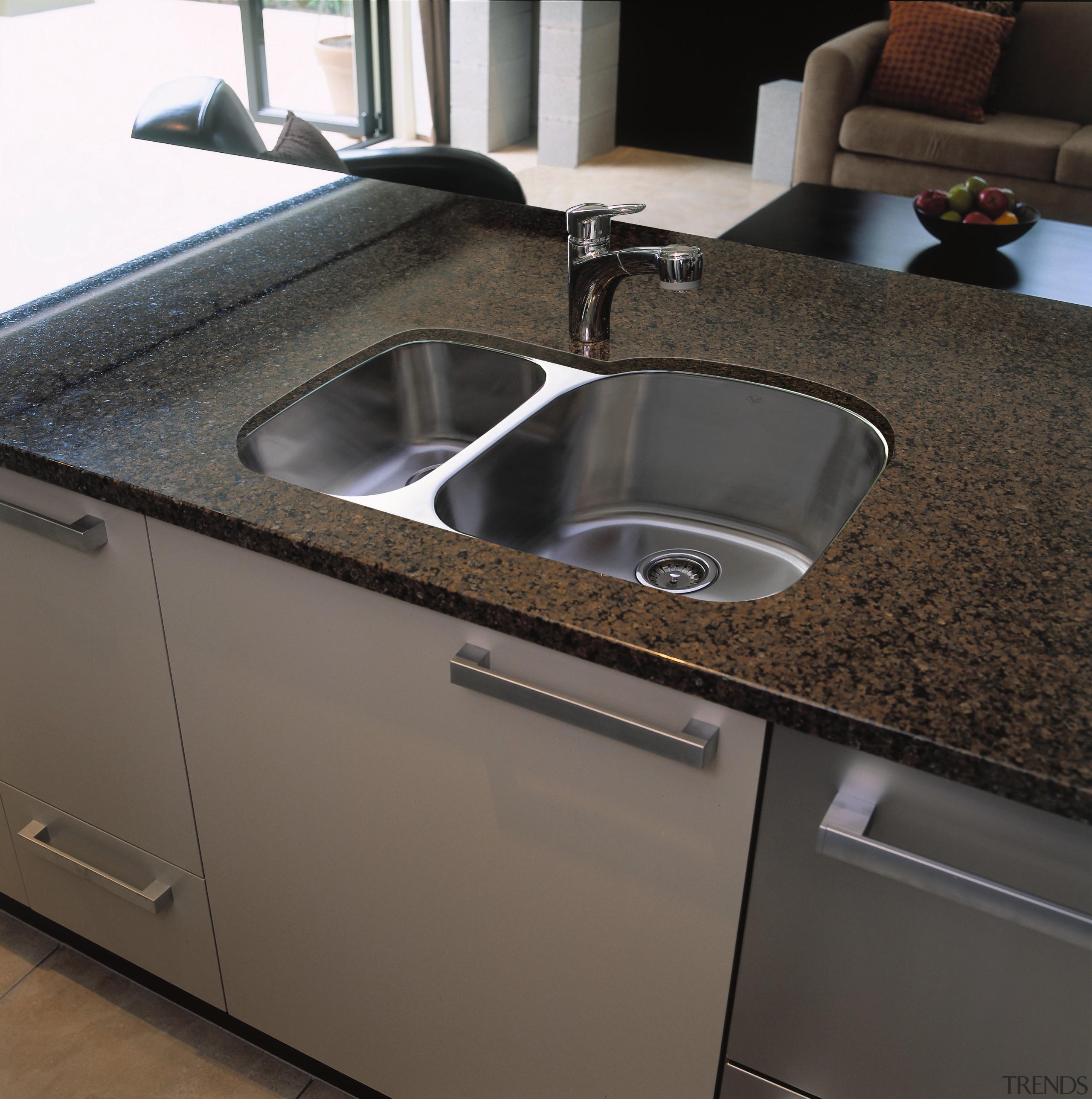 A view of a kitchen, brown benchtop and bathroom sink, countertop, kitchen, plumbing fixture, sink, tap, black, gray