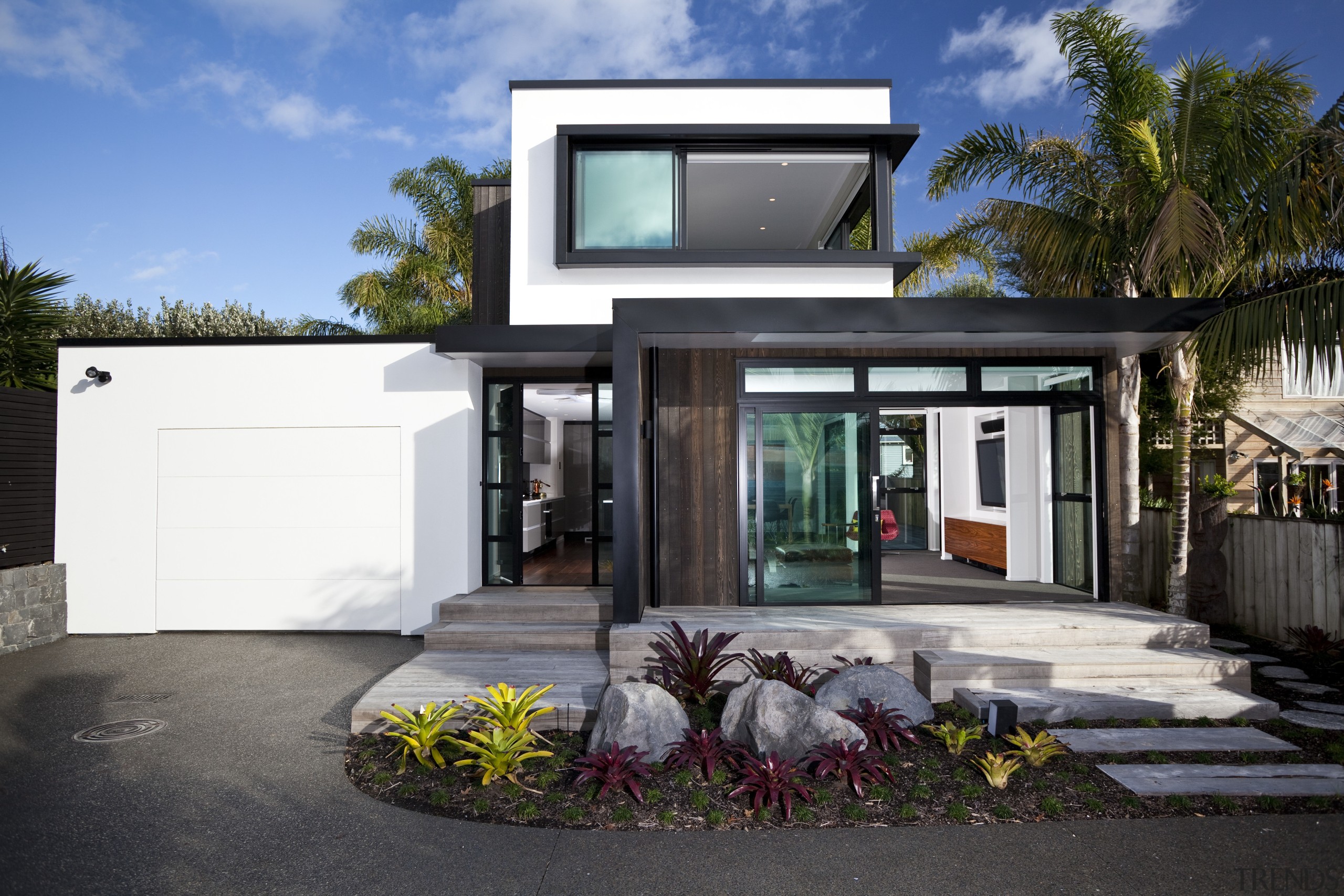 This new house was designed by Richard Furze architecture, elevation, facade, home, house, property, real estate, window, black