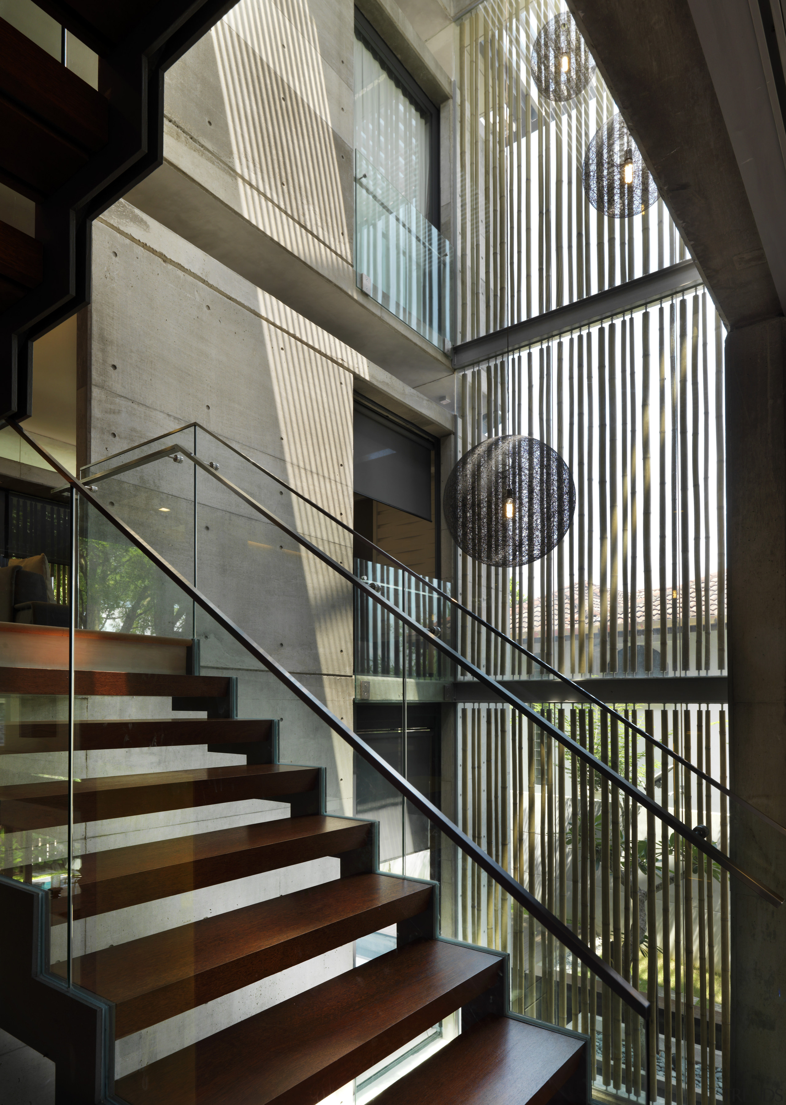 This home was designed with environmental principals in apartment, architecture, building, condominium, daylighting, facade, glass, handrail, house, interior design, lobby, stairs, window, black, gray