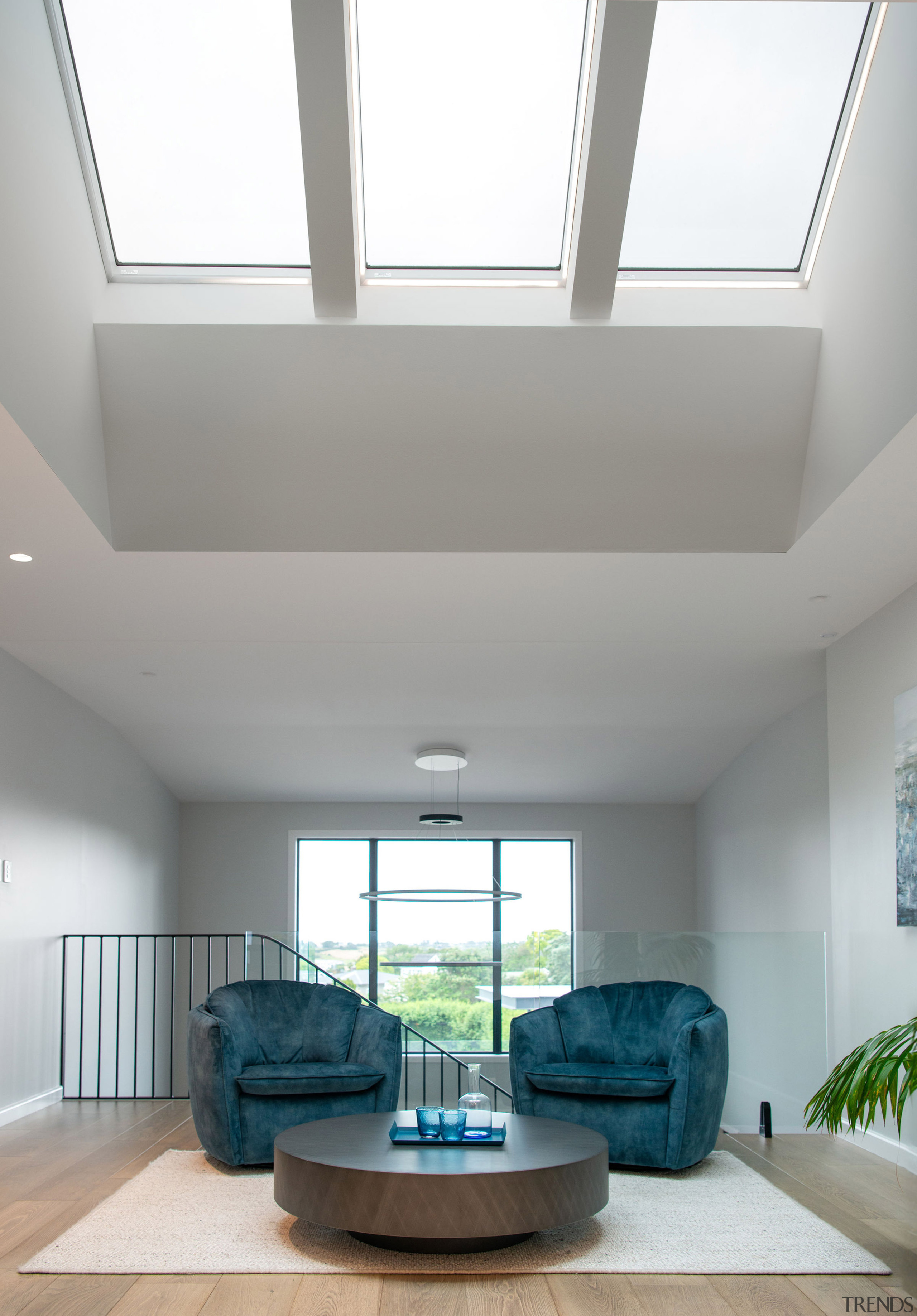 Skylight meets picture window at the top of 