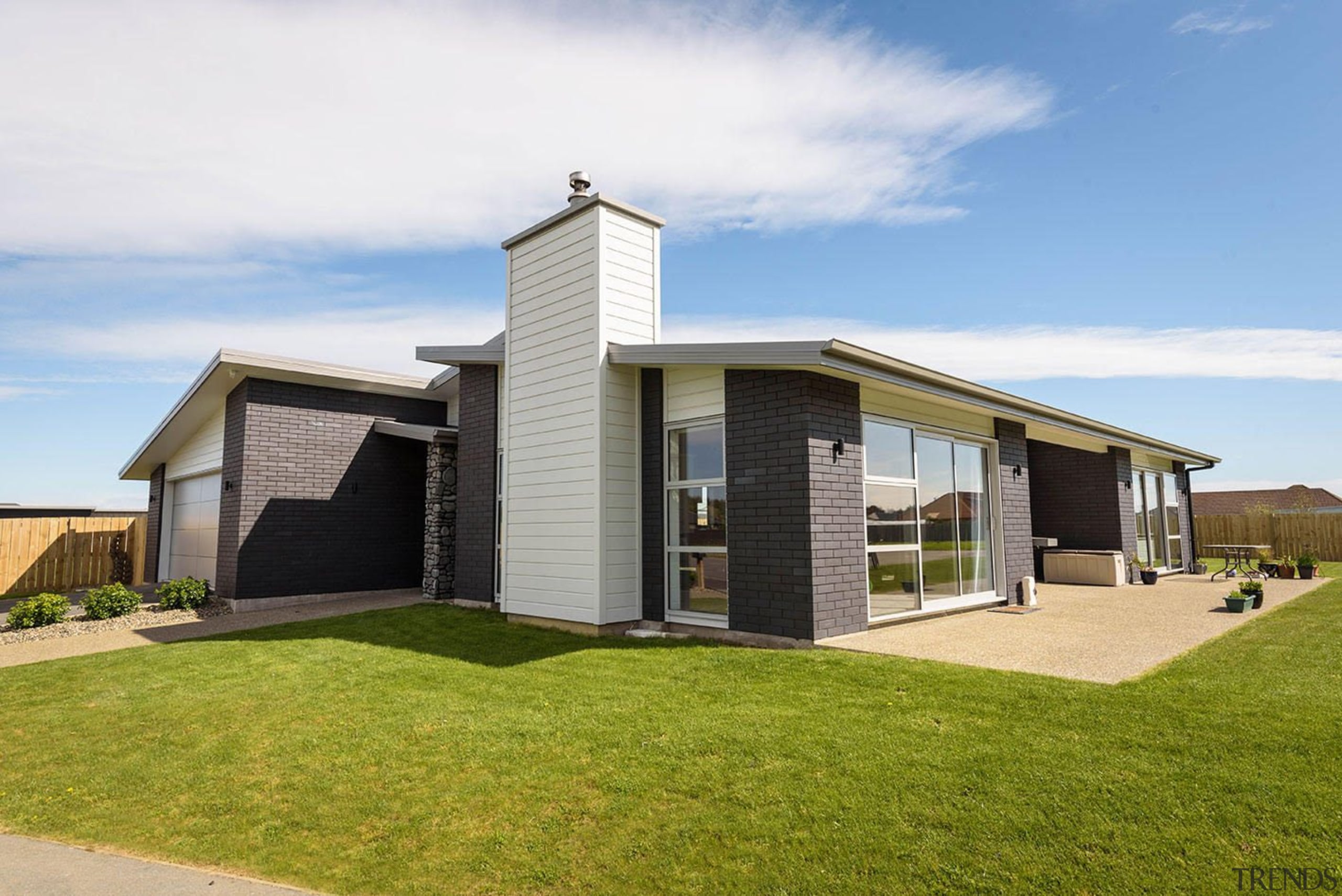 Dark bricks and weatherboard mixed for a striking architecture, cottage, elevation, facade, home, house, property, real estate, residential area, white