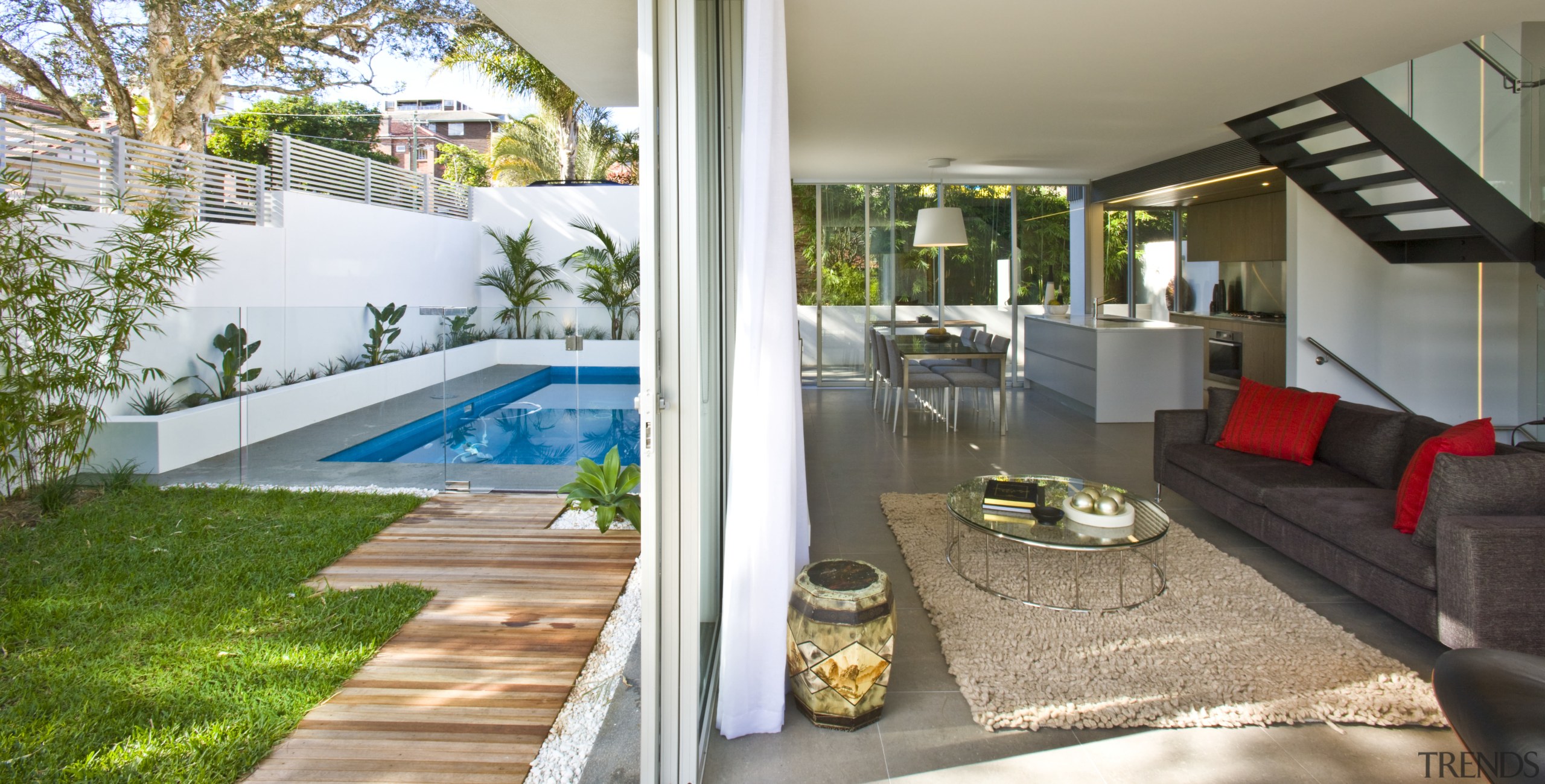 View of open plan living and dining area architecture, backyard, estate, home, house, interior design, patio, property, real estate, yard, gray