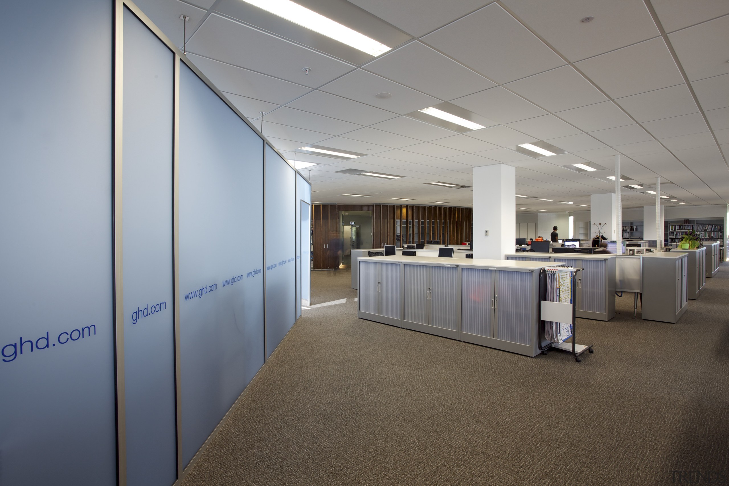 Storage cabinets and workstations in the GHD office. ceiling, daylighting, interior design, office, real estate, gray