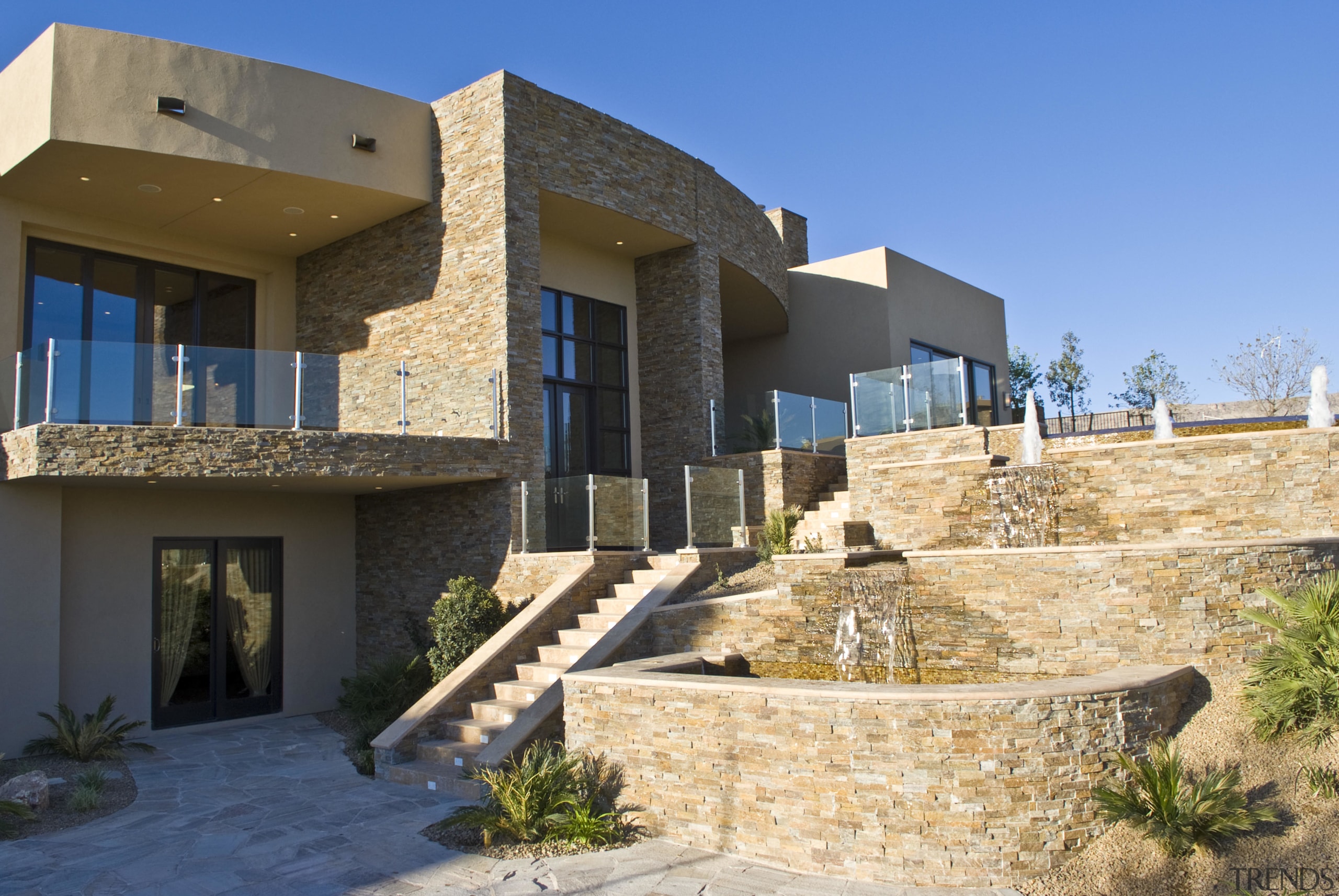 Back view house fountain stairs deck - Back apartment, architecture, building, elevation, estate, facade, hacienda, home, house, property, real estate, residential area, villa, orange