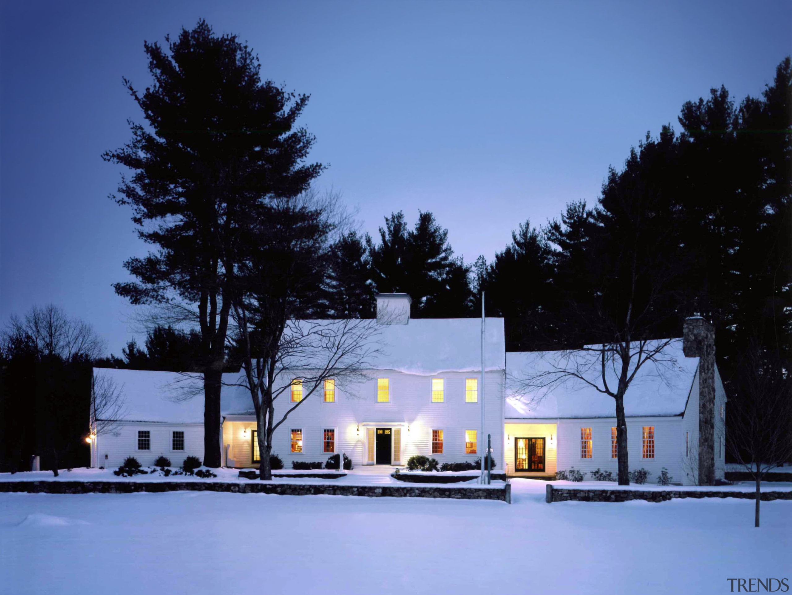 Image of the exterior of this newly renovated architecture, building, cottage, estate, evening, facade, farmhouse, freezing, home, house, lighting, property, real estate, residential area, sky, snow, suburb, tree, villa, winter, teal, black