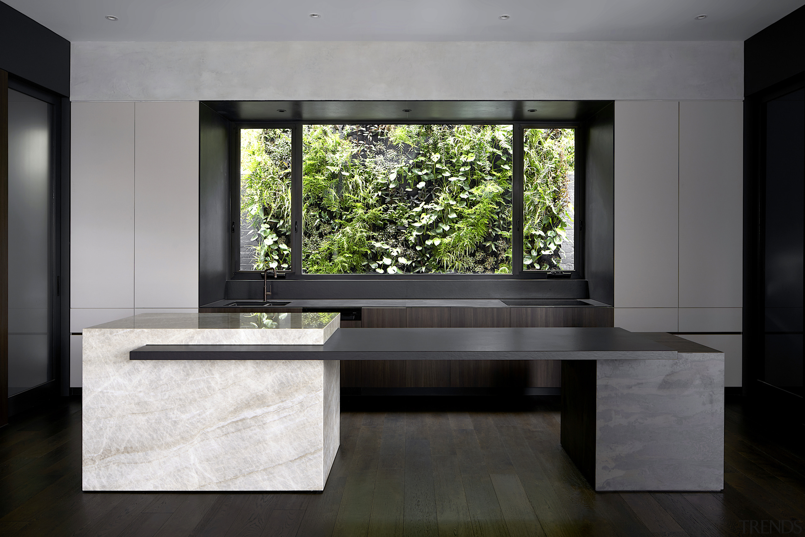 The island’s form and robust materials achieve a 