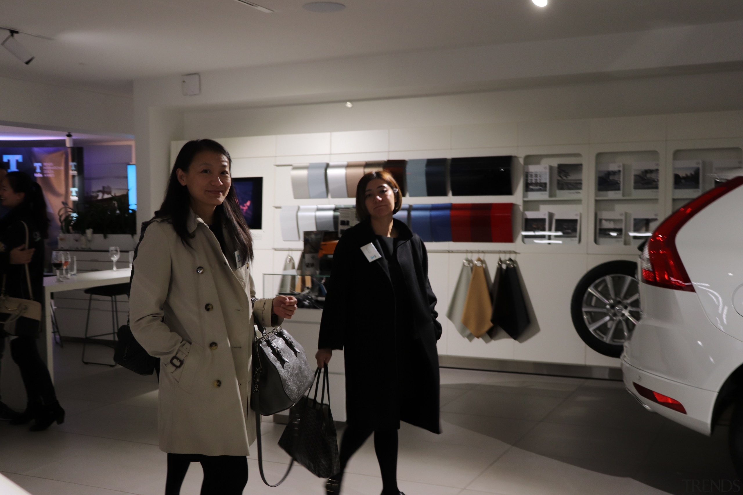 Joyce Zhao and Elena Wang.jpg - auto show auto show, automotive design, car, fashion, luxury vehicle, motor vehicle, outerwear, socialite, vehicle, gray, black