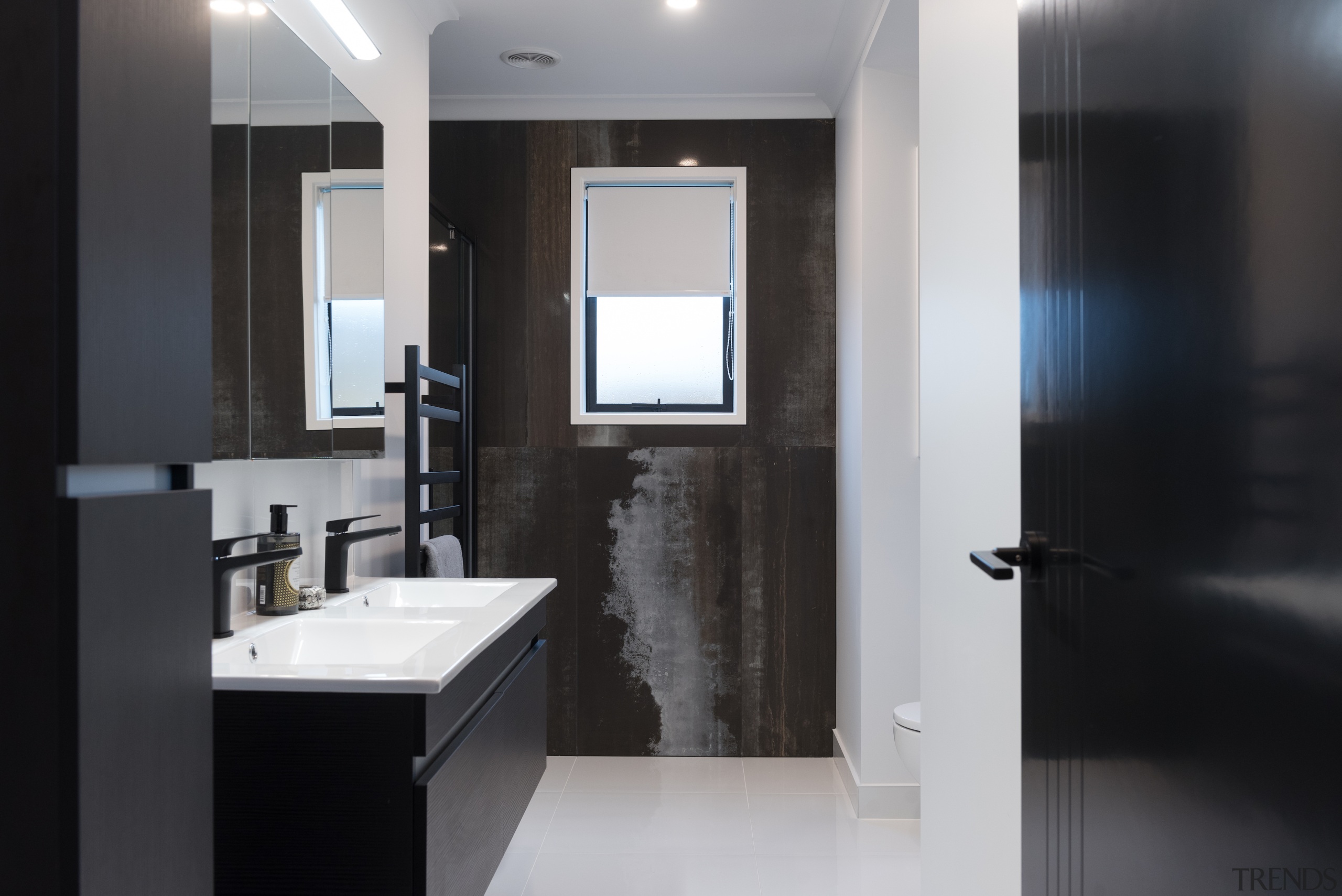 Character finishes continue into the master ensuite with 