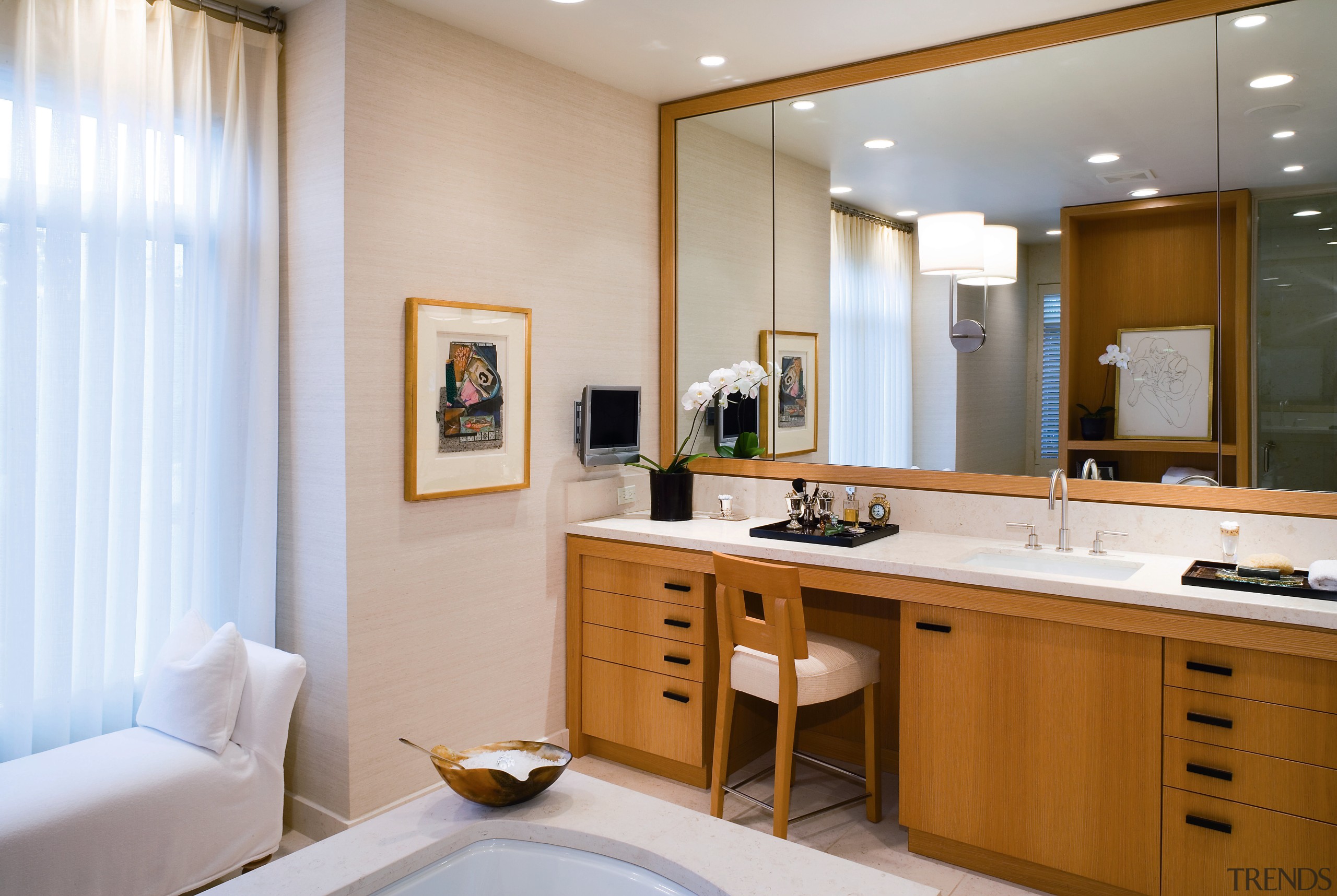 view of the bathroom featuring rift oak cabinetry, bathroom, bathroom accessory, interior design, room, gray