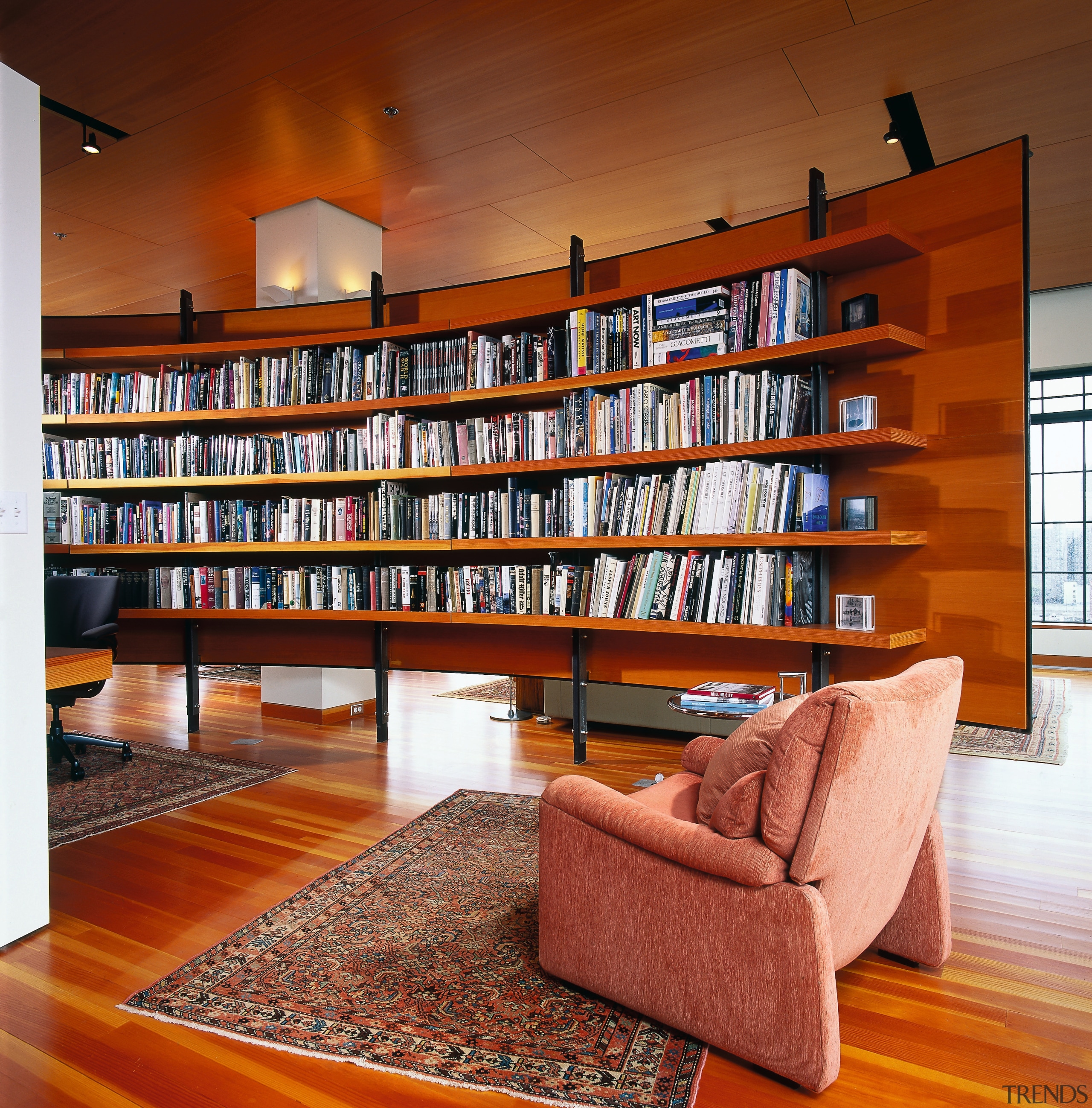 View of the library, wooden flooring, ceiling and bookcase, furniture, interior design, library, living room, public library, shelving, wood, brown