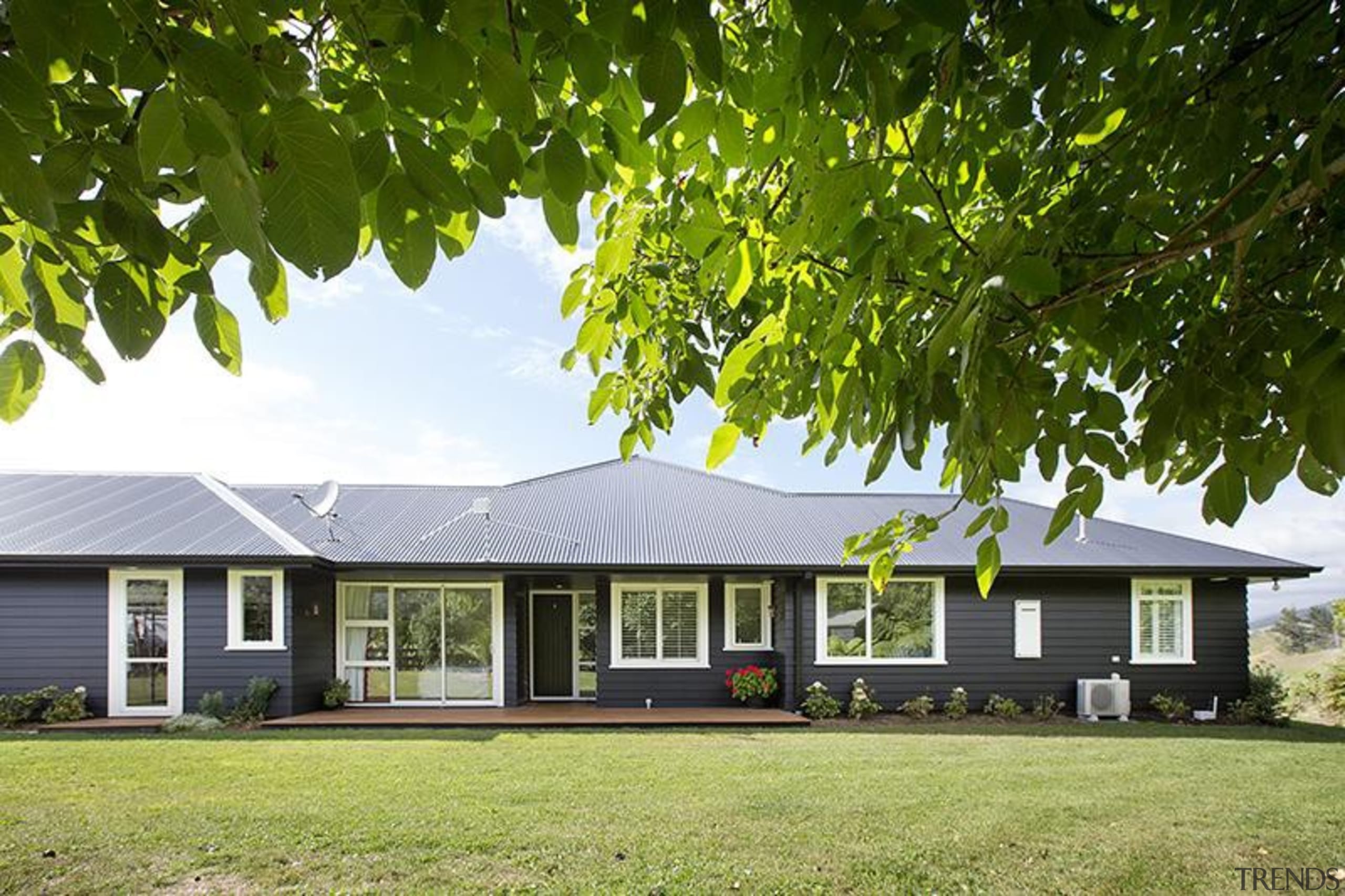 Fowler Homes Tauranga.Gold reserve winner and National finalist cottage, estate, facade, farmhouse, grass, home, house, landscape, lawn, plant, plantation, property, real estate, tree, brown