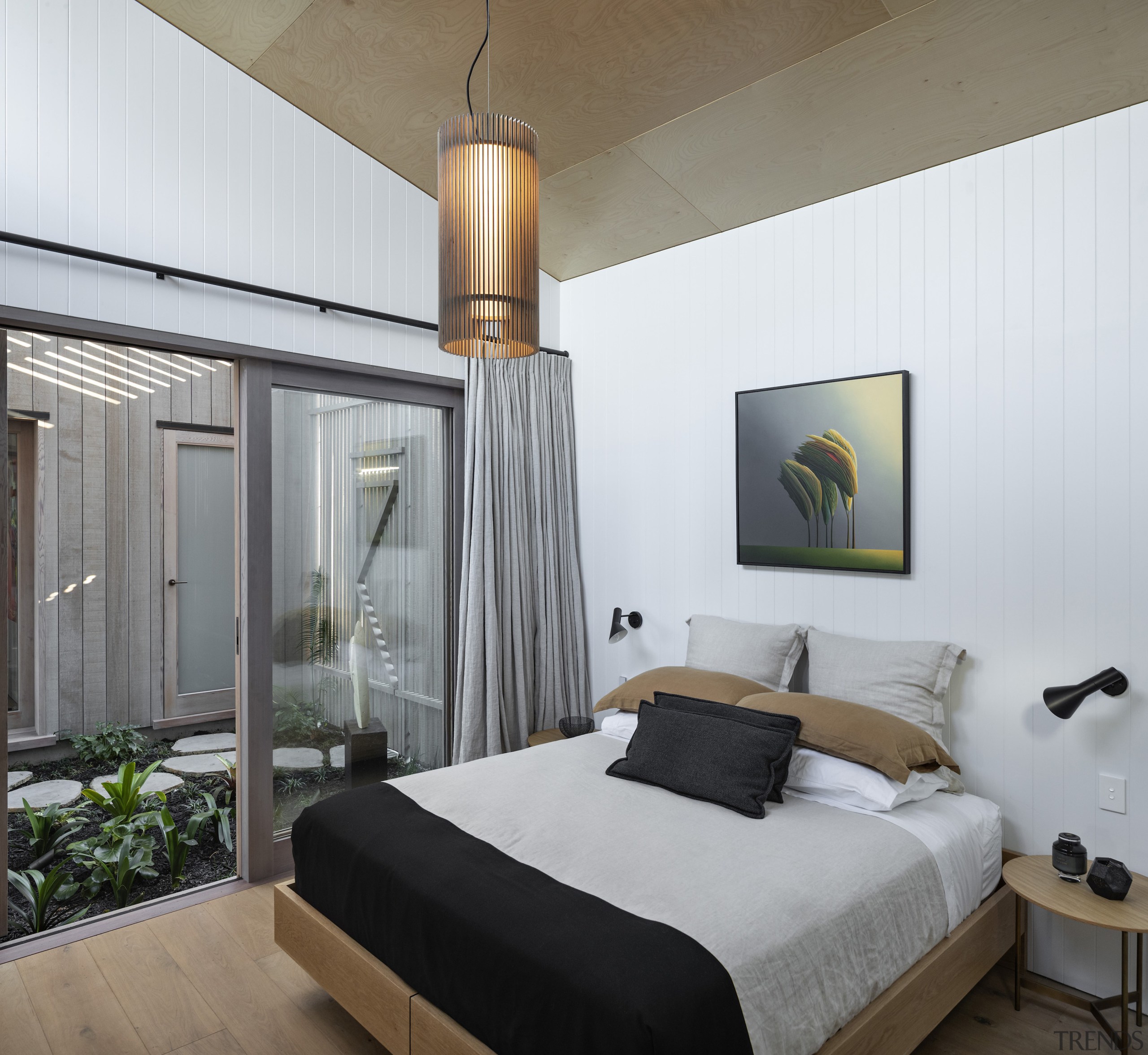 The indoor garden separates the master suite from 