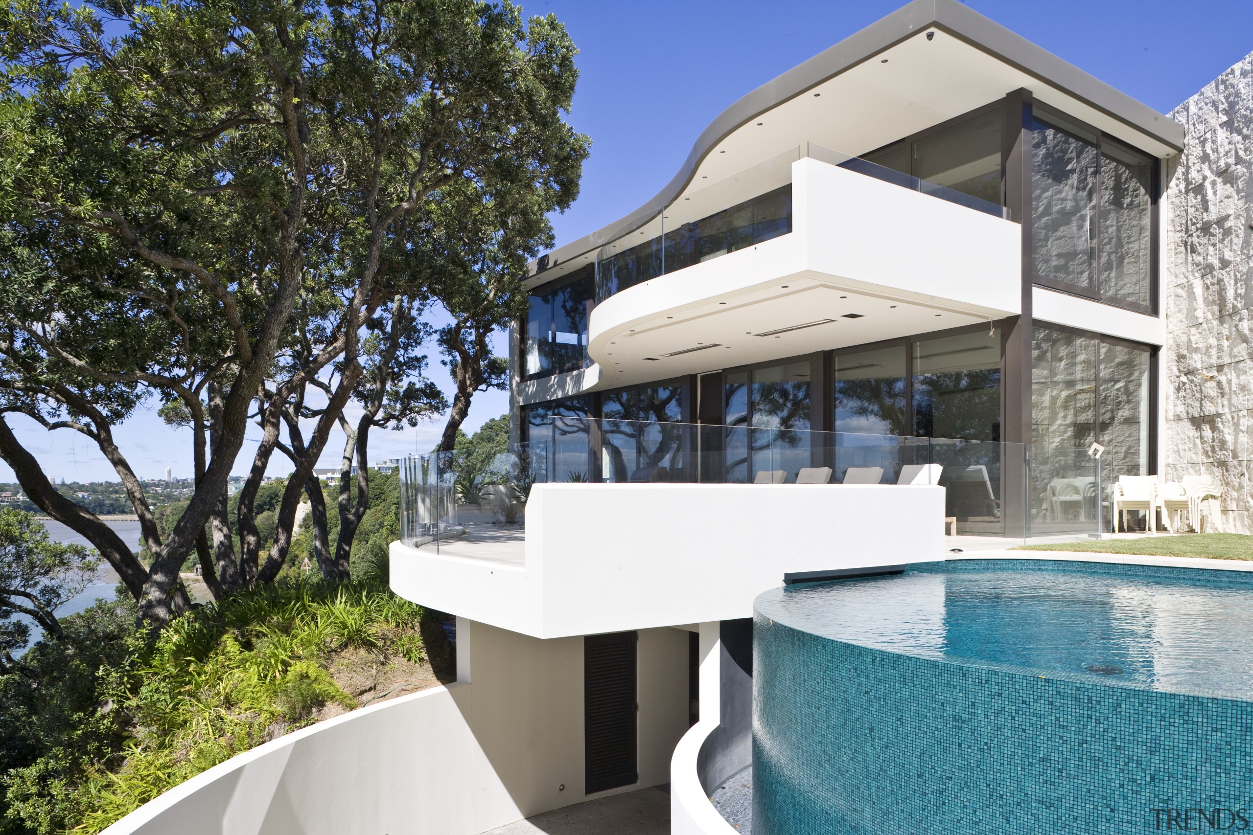 Exterior view of A Waterside house made of architecture, estate, home, house, property, real estate, swimming pool, villa, white