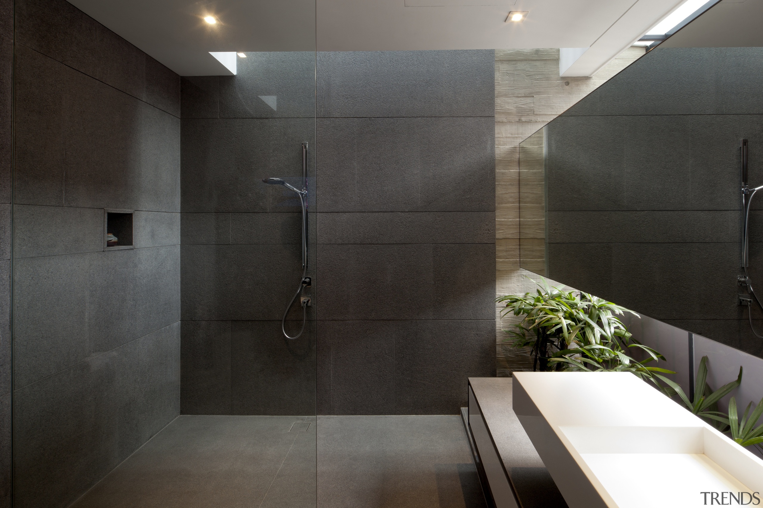 The guest bathroom in this tropical family home architecture, bathroom, ceiling, floor, flooring, glass, house, interior design, room, tile, wall, black