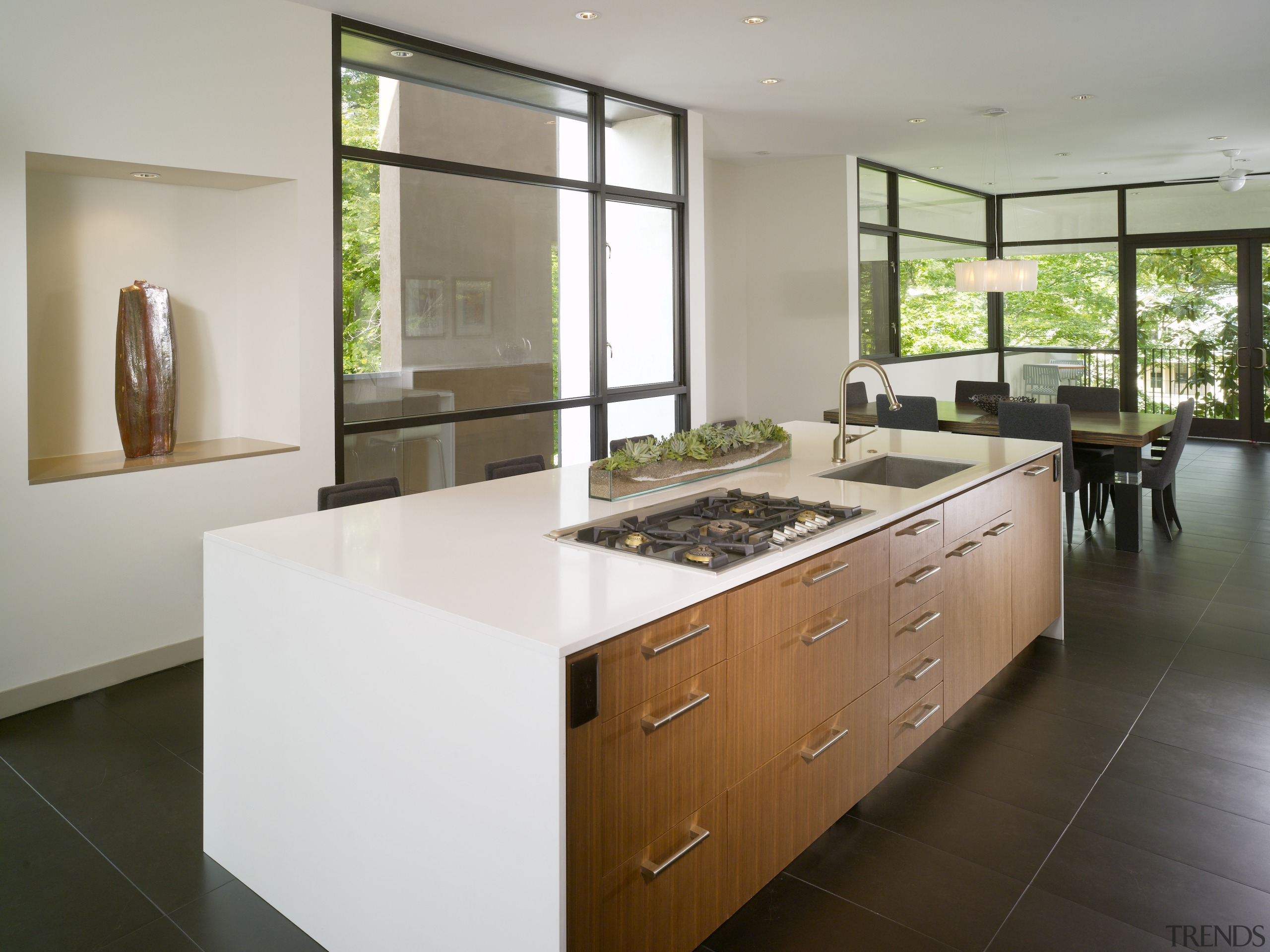 View of island with white countertop, wooden cabinetry cabinetry, countertop, cuisine classique, interior design, kitchen, real estate, room, gray, brown