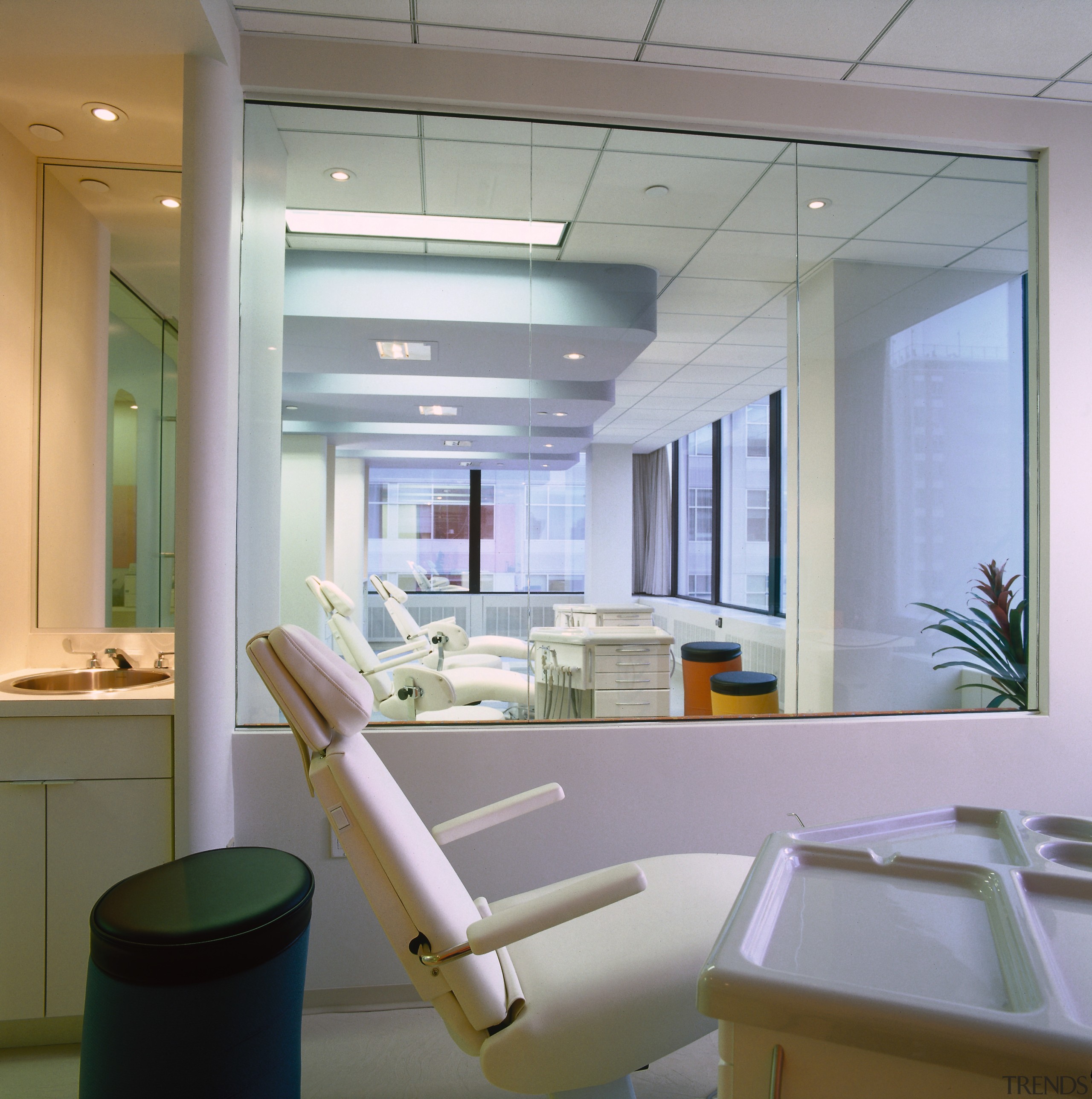 A view of an orthodontists room. - A ceiling, interior design, window, gray