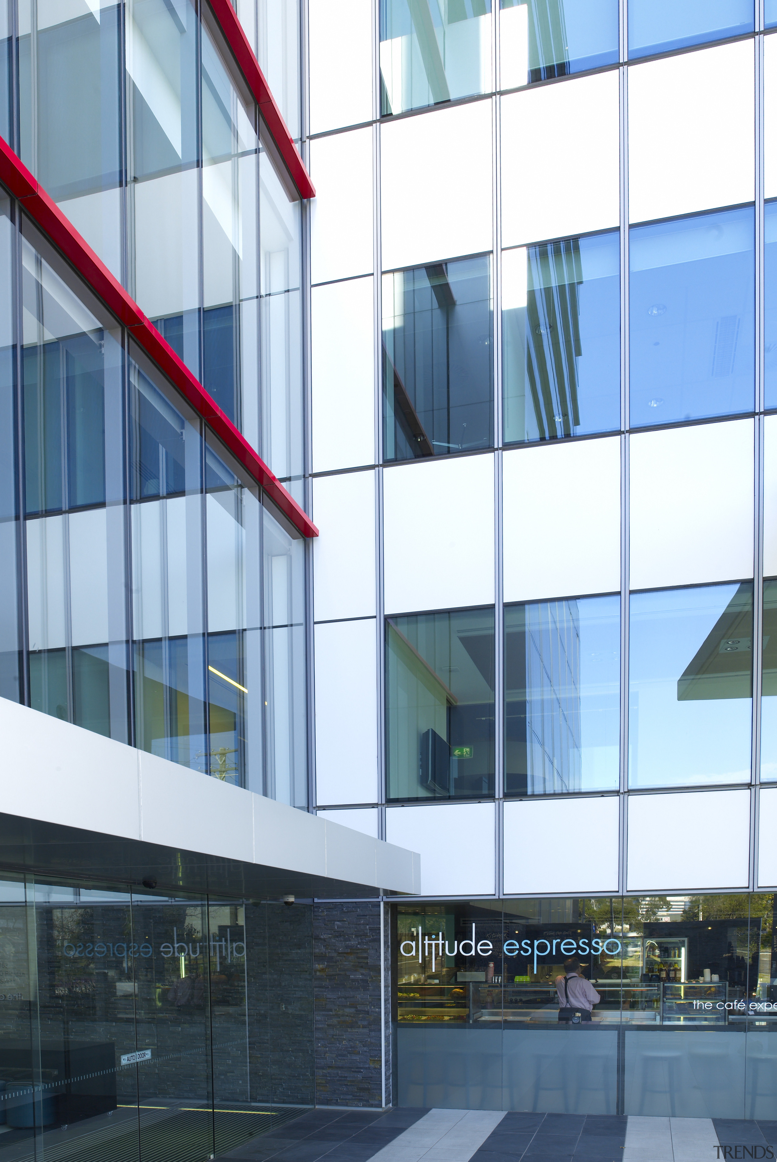 Exterior view of the new environmentally friendly Electrolux apartment, architecture, building, commercial building, condominium, corporate headquarters, daylighting, daytime, facade, glass, headquarters, line, metropolitan area, mixed use, real estate, sky, structure, window, teal, white