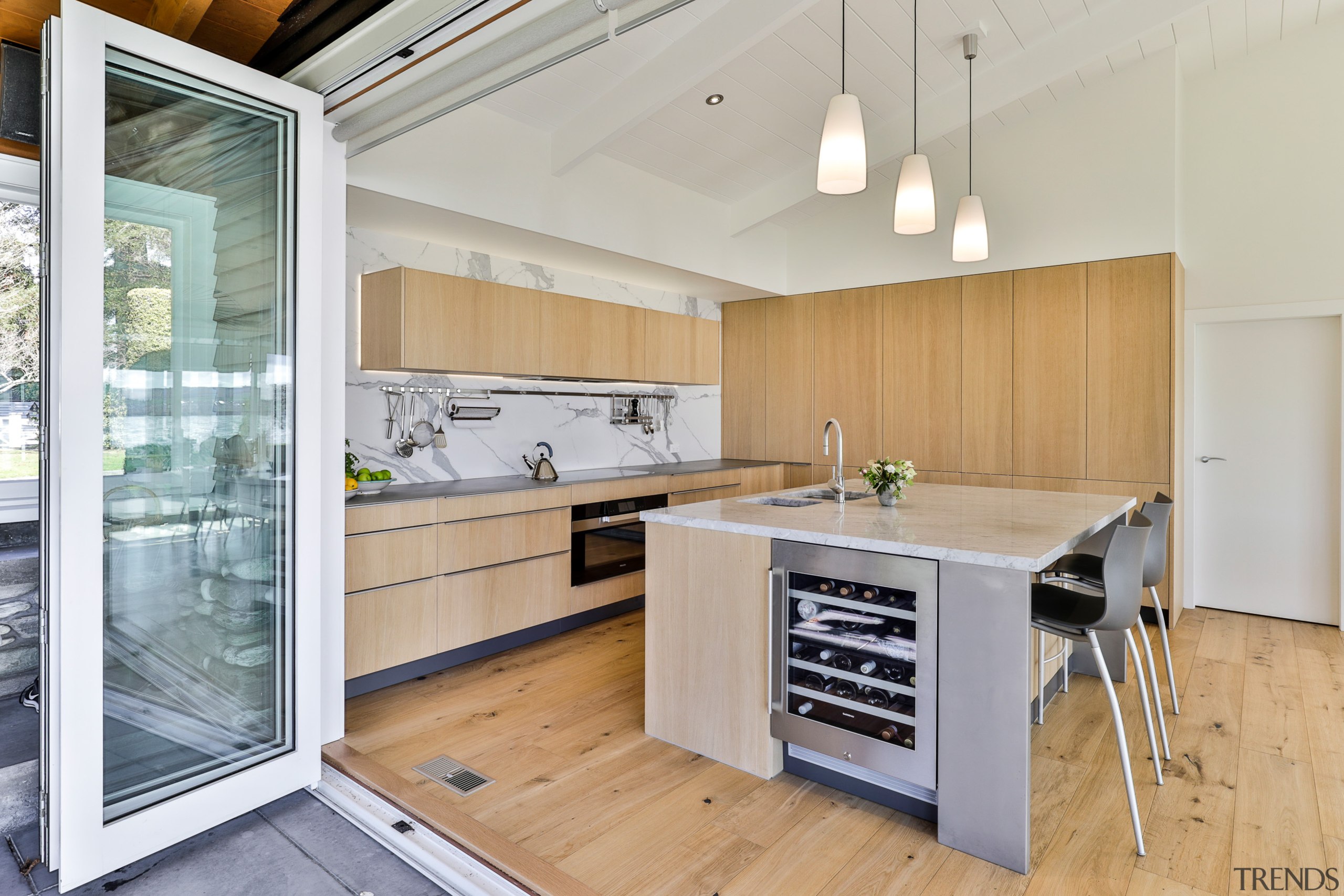 Bi-fold doors complete the servery window. - Surface 