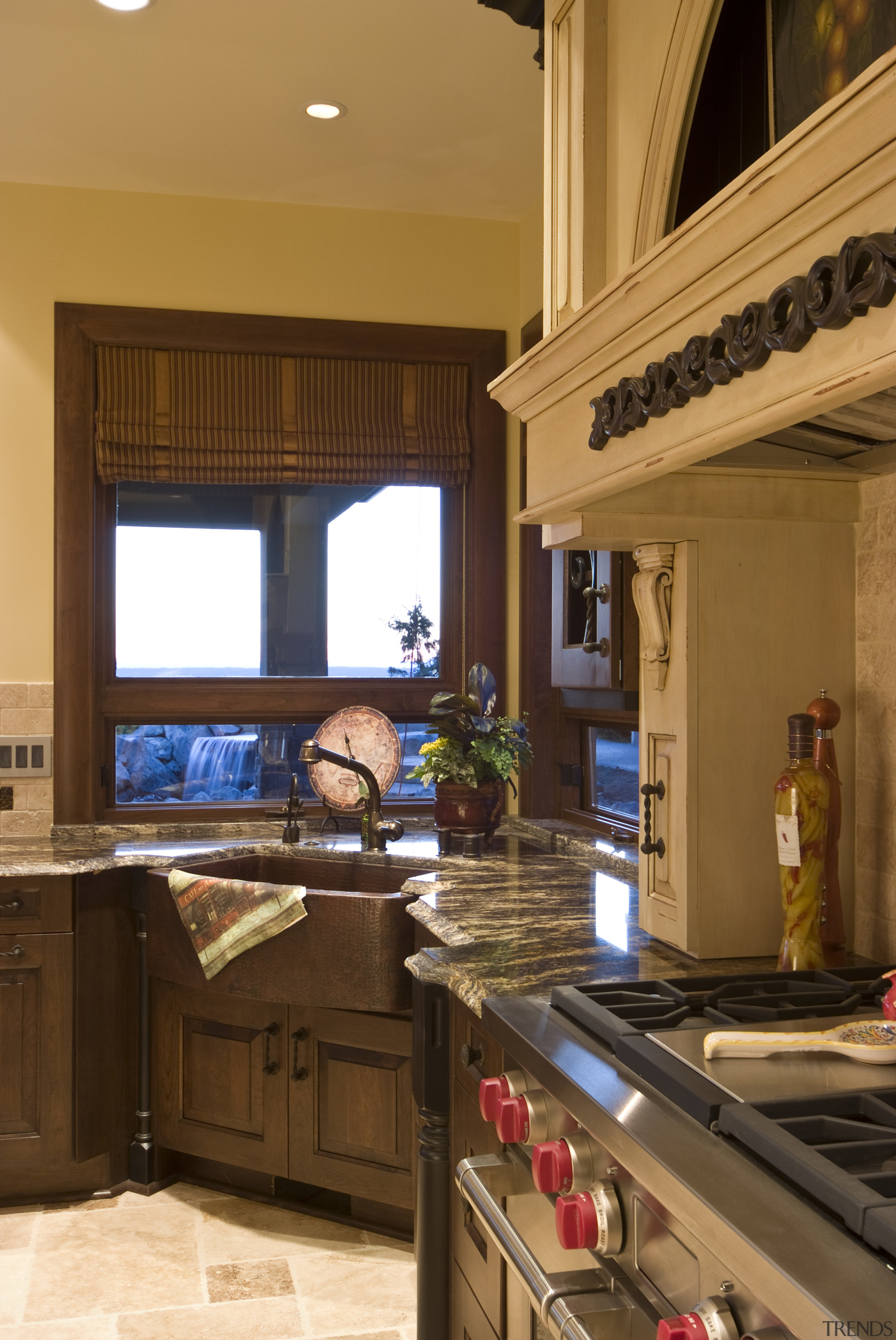 Pacific Crest Industries design and manufacture custom cabinetry cabinetry, countertop, cuisine classique, interior design, kitchen, room, under cabinet lighting, window, brown, orange