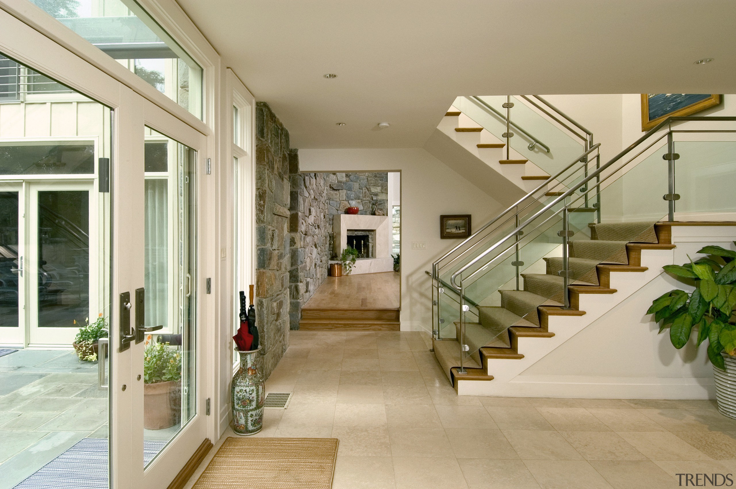 view of the remodelled living are that created architecture, daylighting, estate, floor, flooring, handrail, home, house, interior design, lobby, real estate, stairs, orange, brown