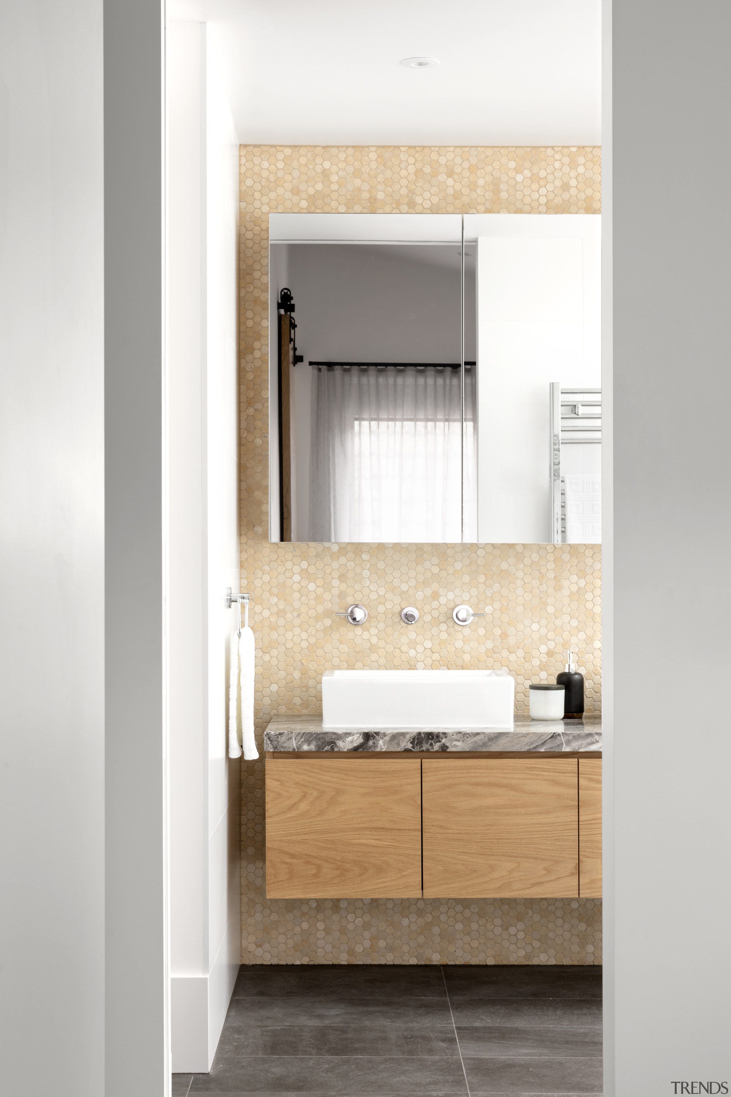 ​​​​​​​The honeycomb tile feature wall in the ensuite architecture, bathroom, floor, flooring, vanity unit, taps, Mcmaon & Nerlich