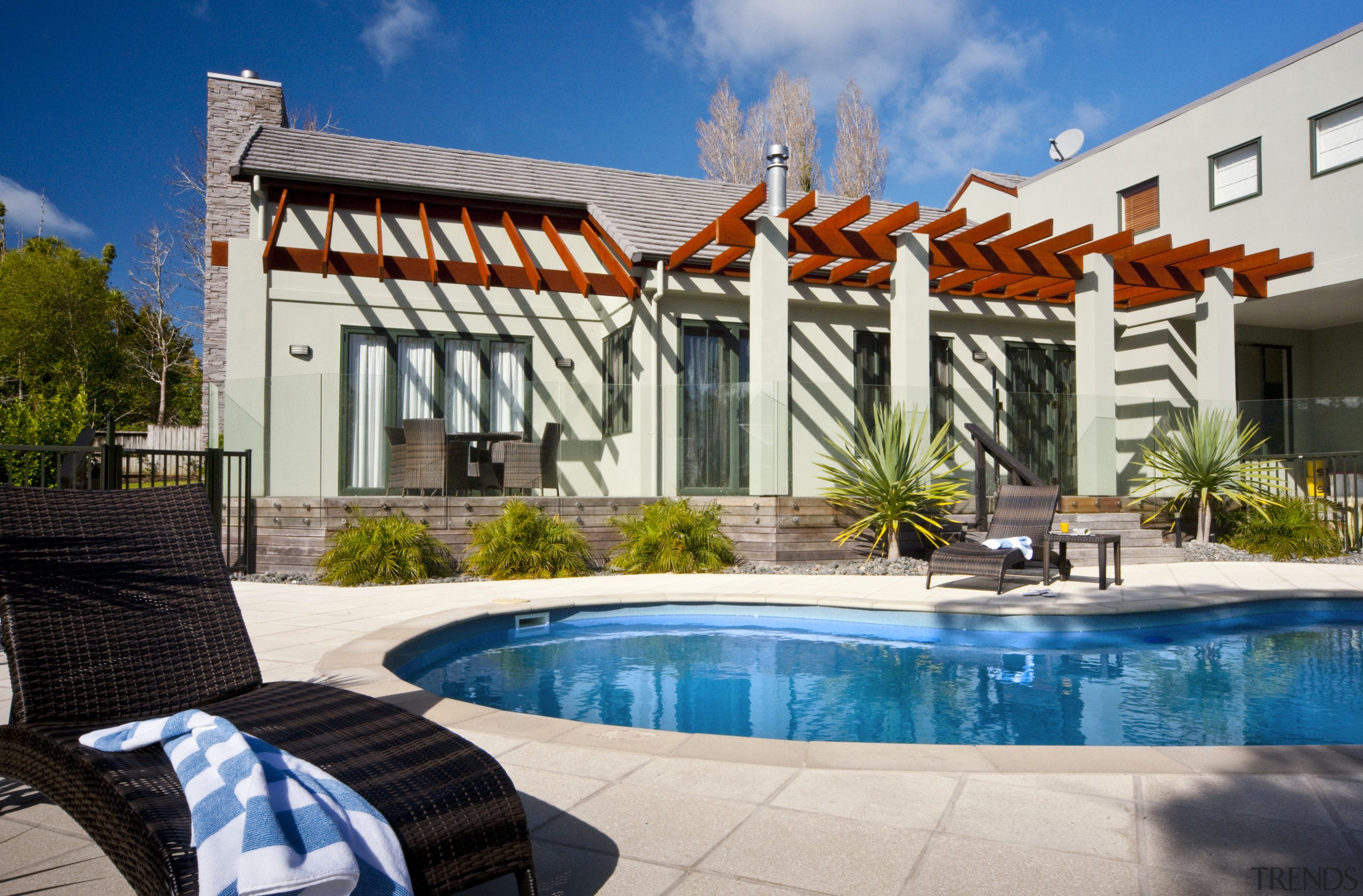 View of outdoor living space designed by Ian apartment, backyard, estate, home, house, leisure, property, real estate, resort, swimming pool, villa, white