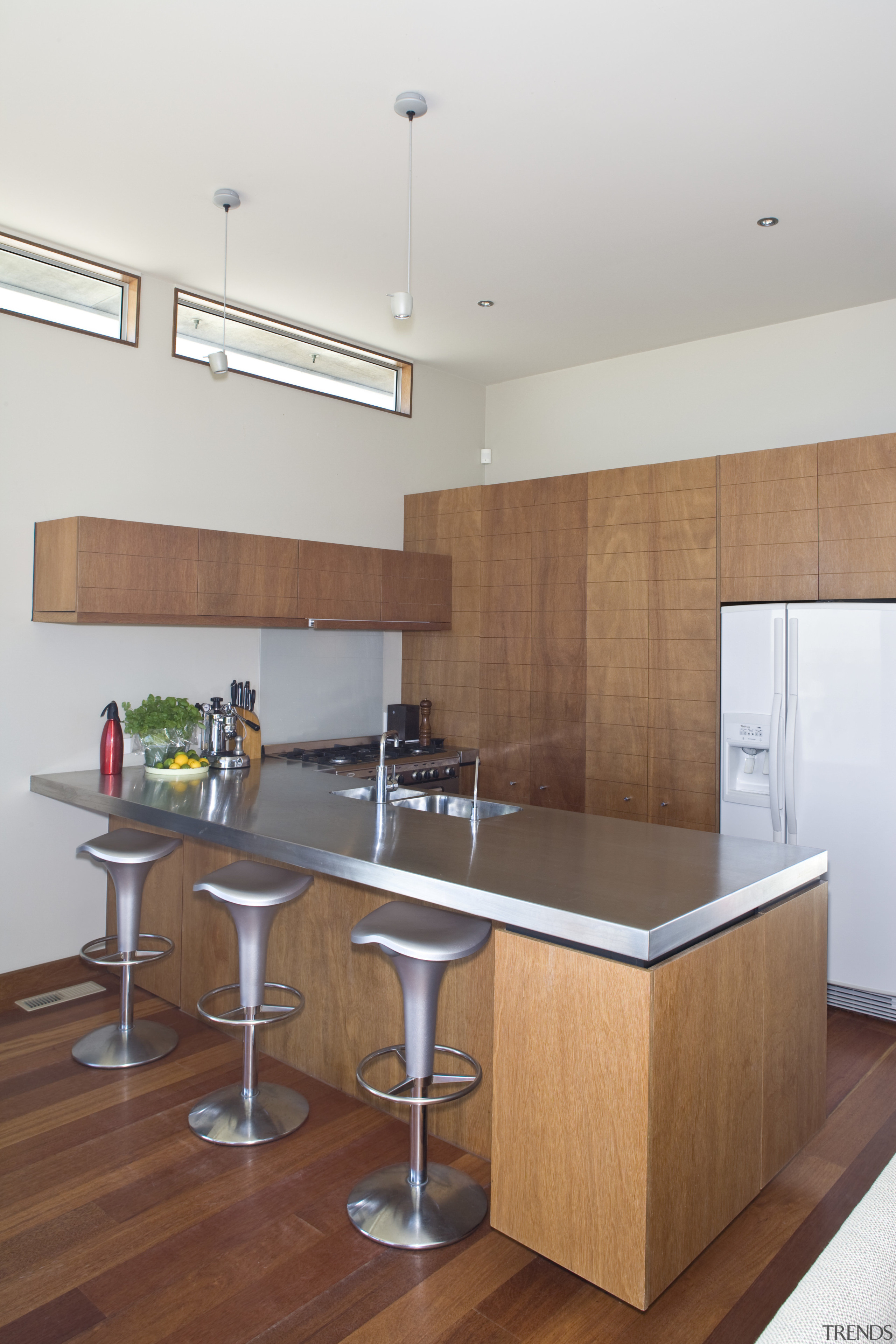 Wood joinery gives a relaxed feel to this cabinetry, countertop, floor, hardwood, interior design, kitchen, real estate, room, wood, white, brown