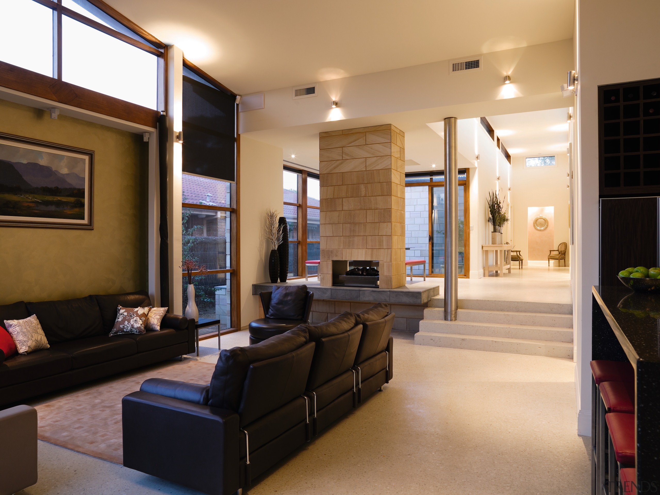 A view of this living area featuring carpet ceiling, interior design, living room, lobby, real estate, room, black, orange
