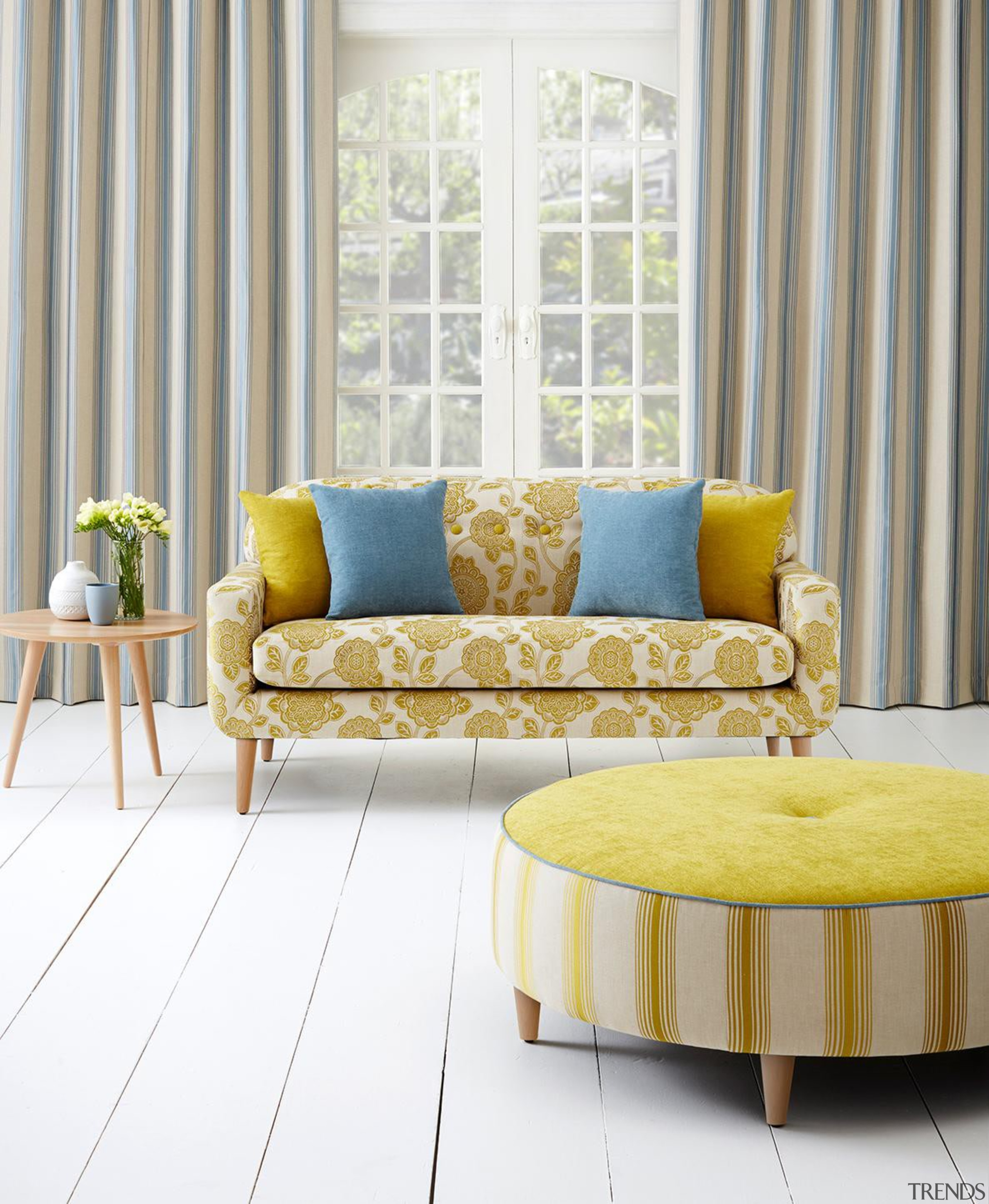 The versatility of our Naomi Collection is deceiving chair, coffee table, couch, floor, furniture, home, interior design, living room, loveseat, sofa bed, studio couch, table, window, window covering, yellow, white, gray
