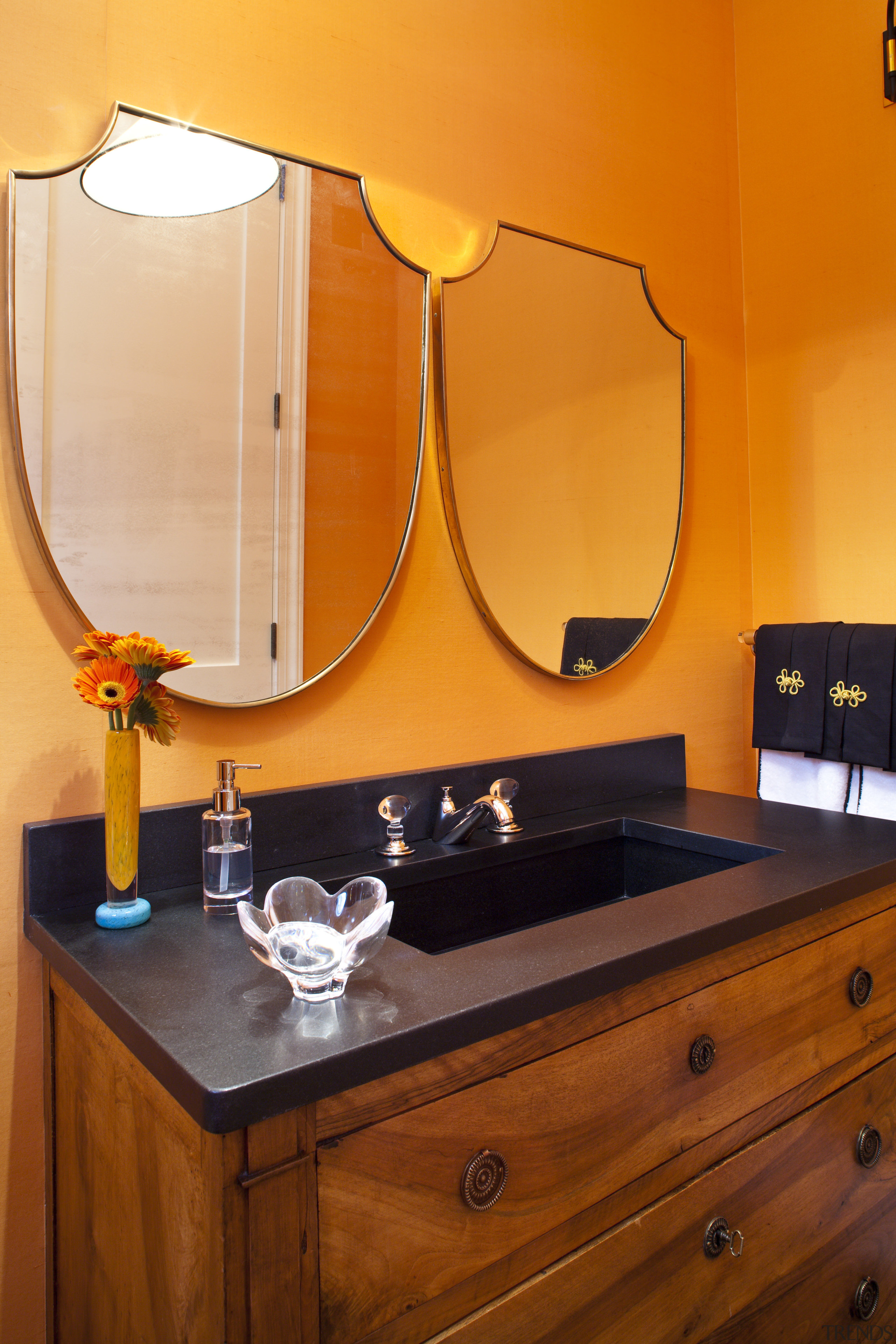 Close up view of this unique vanity unit bathroom, ceiling, countertop, furniture, home, interior design, lighting, orange, room, sink, table, wall, orange