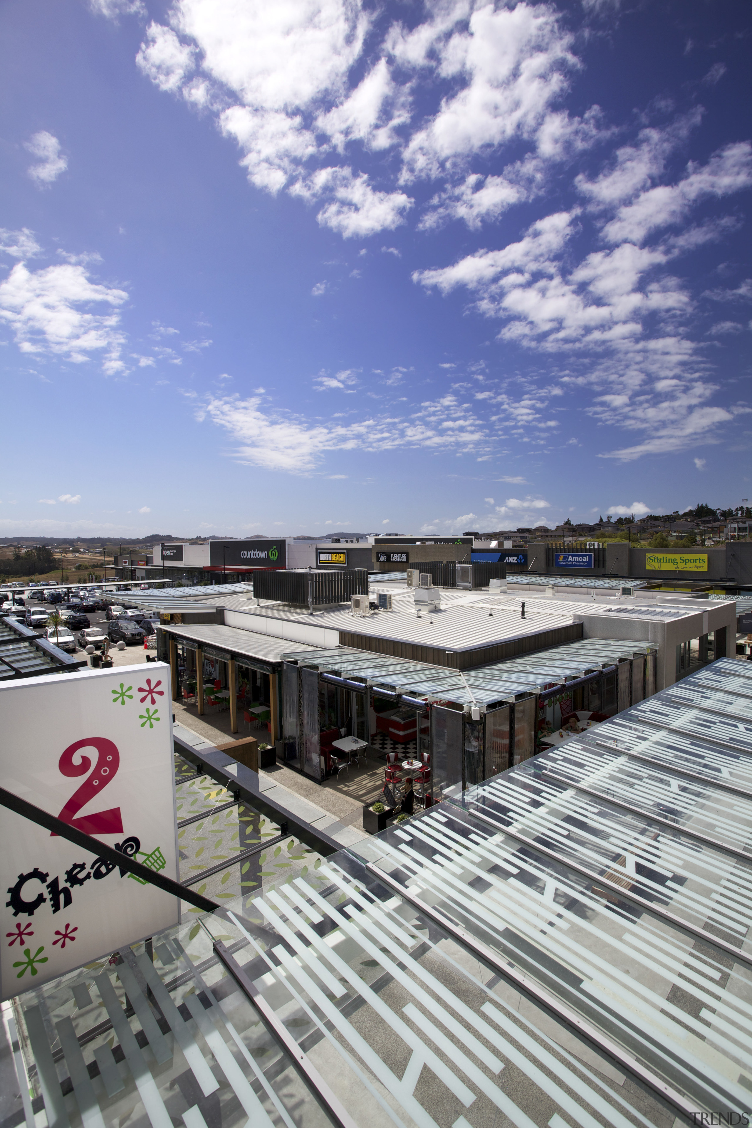 Silverdale Centre by The Warehouse Group - Silverdale architecture, building, city, cloud, daytime, metropolitan area, real estate, residential area, roof, sky, urban area, gray, blue